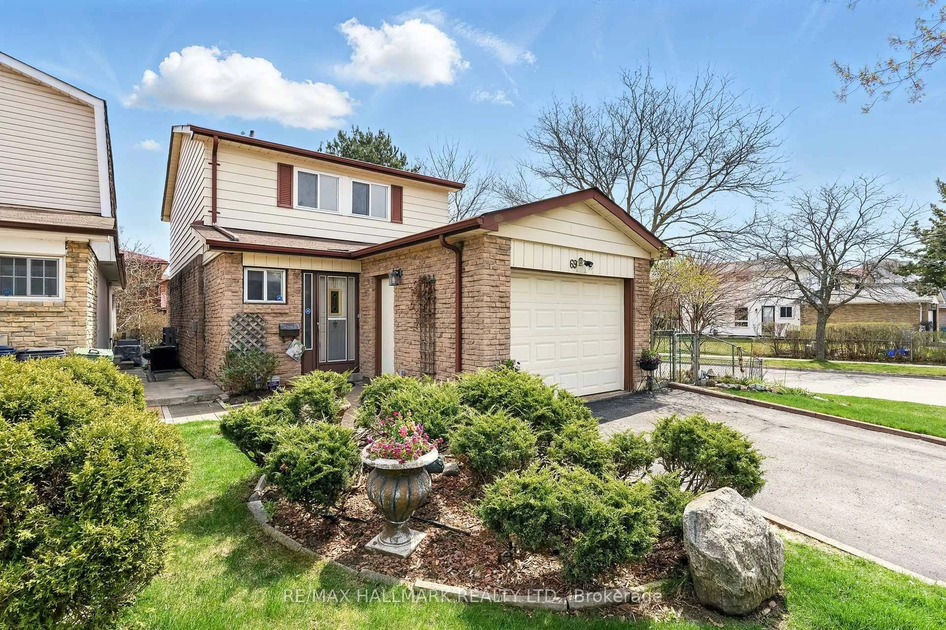 Home with brick exterior material, street for 69 White Heather Blvd, Toronto Ontario M1V 1P7