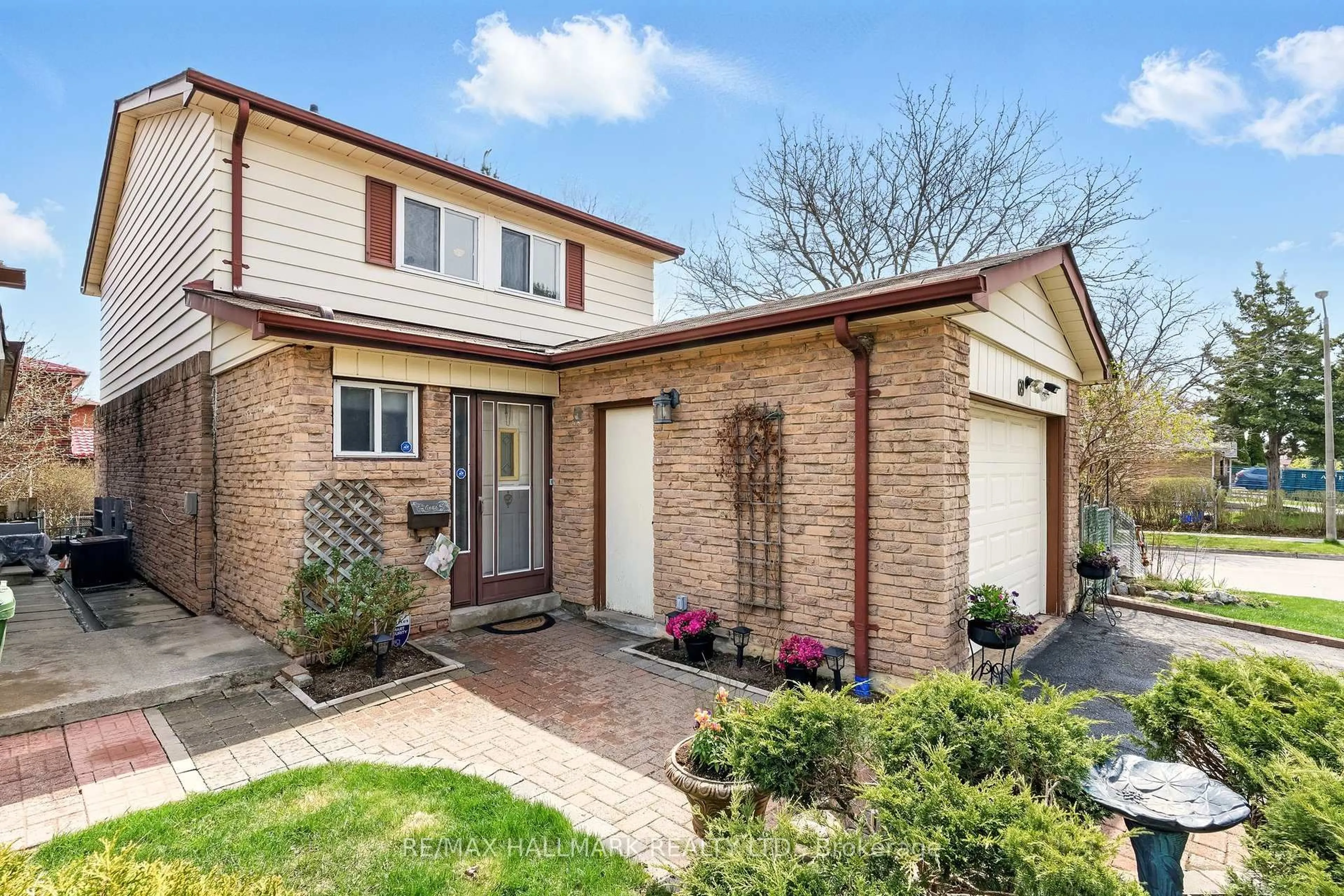 Home with brick exterior material, street for 69 White Heather Blvd, Toronto Ontario M1V 1P7