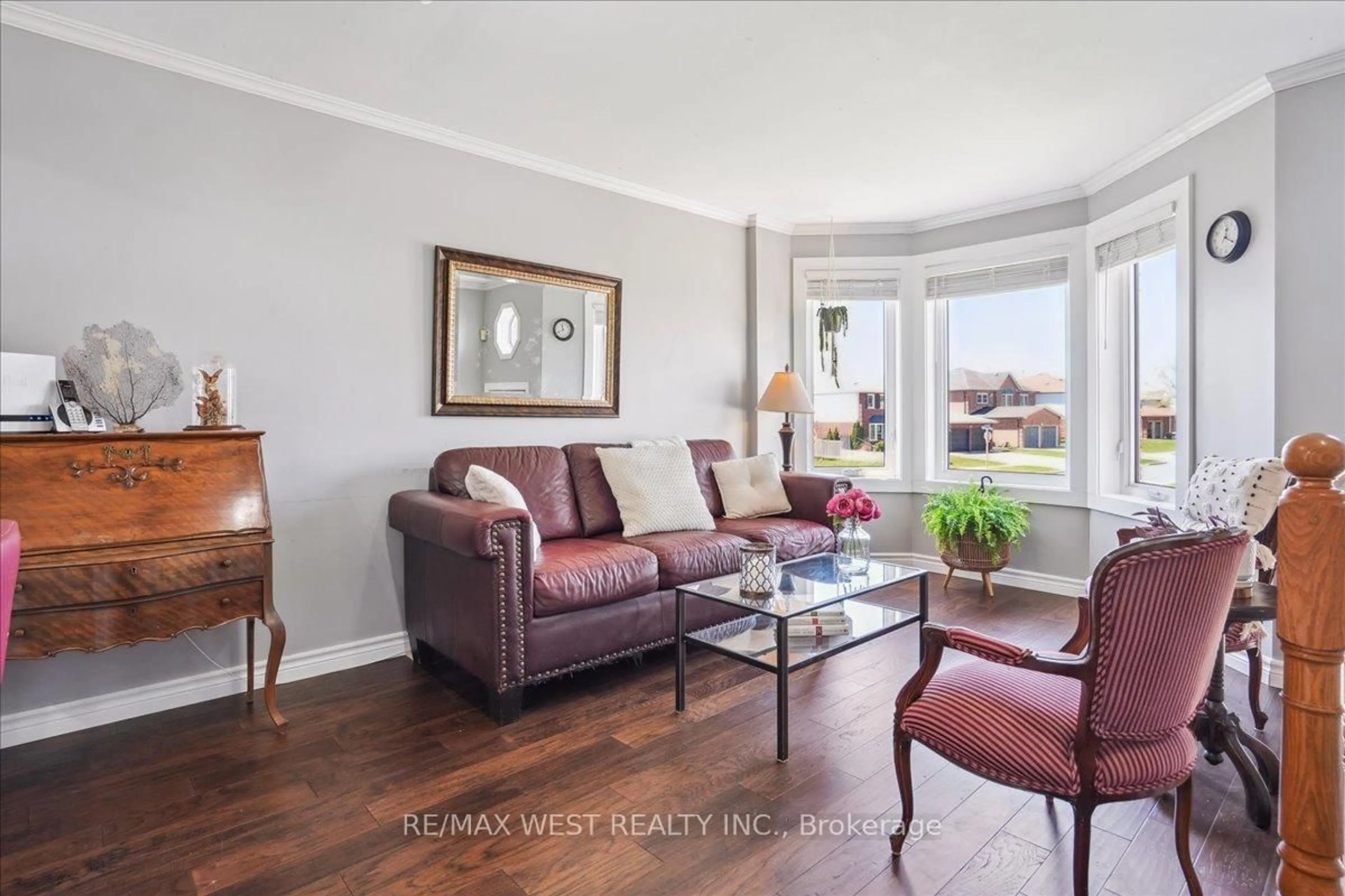 Living room with furniture, wood/laminate floor for 783 Grandview St, Oshawa Ontario L1K 2K1