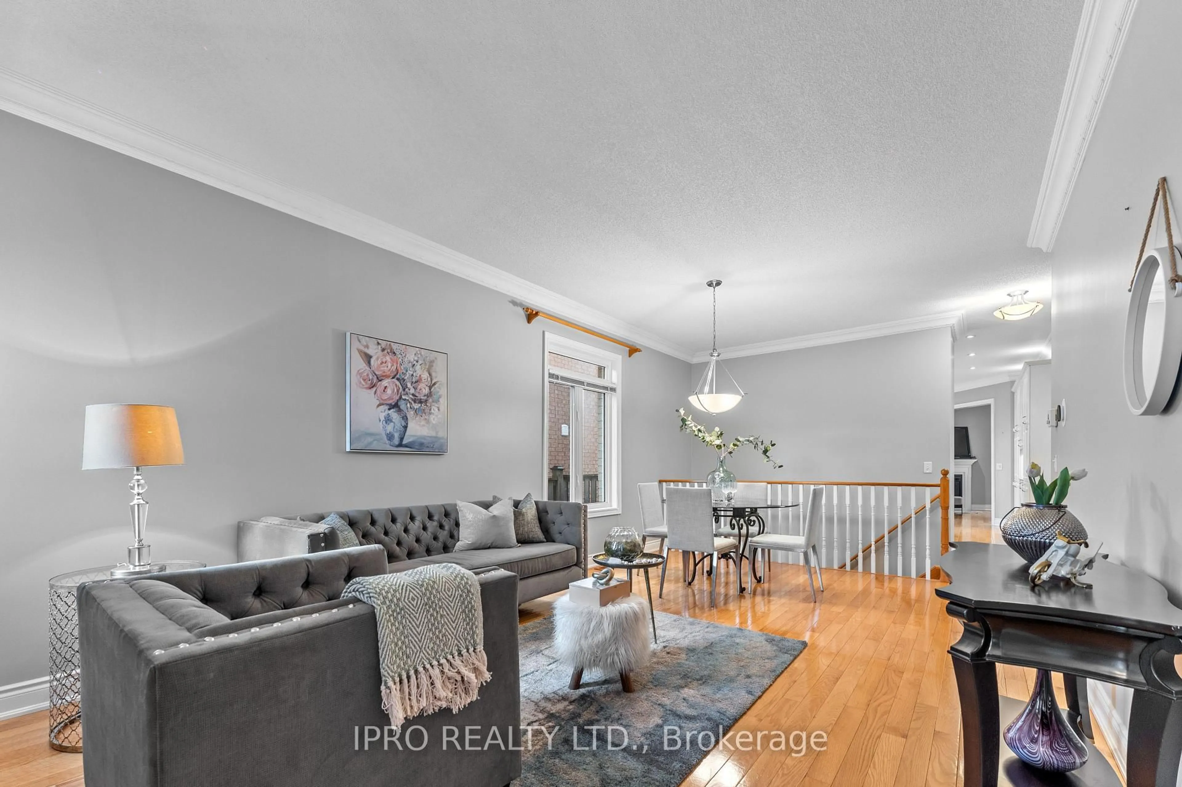 Living room with furniture, wood/laminate floor for 973 Ormond Dr, Oshawa Ontario L1K 3C1