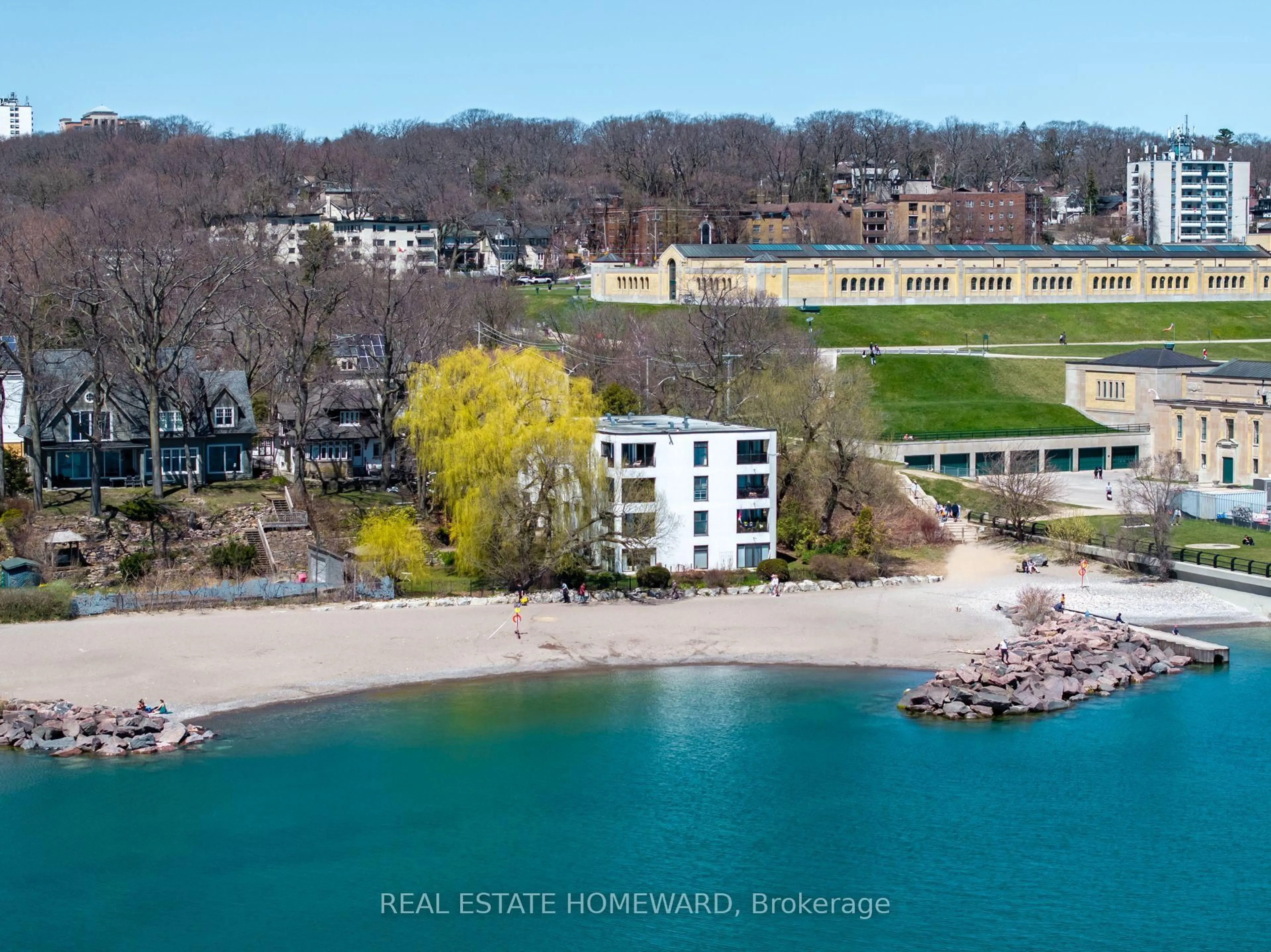 A pic from outside/outdoor area/front of a property/back of a property/a pic from drone, water/lake/river/ocean view for 2 Nursewood Rd #2, Toronto Ontario M4E 3R8