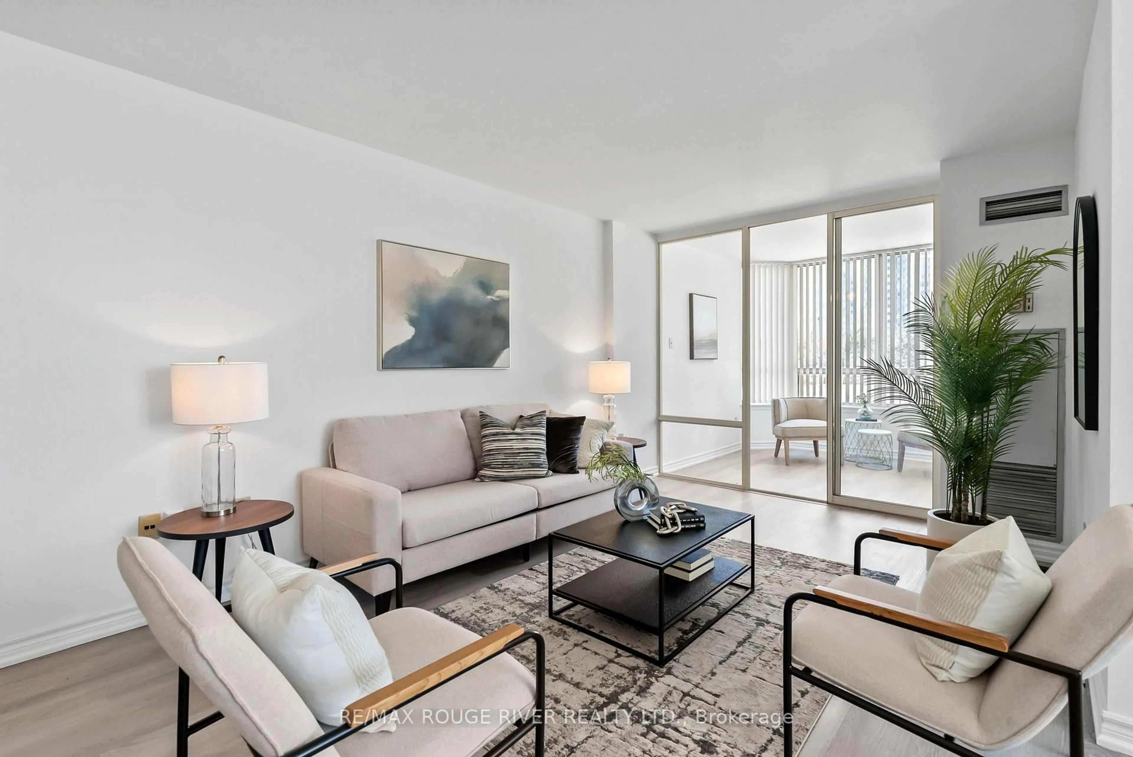 Living room with furniture, unknown for 300 Alton Towers Circ ##210, Toronto Ontario M1V 4X9