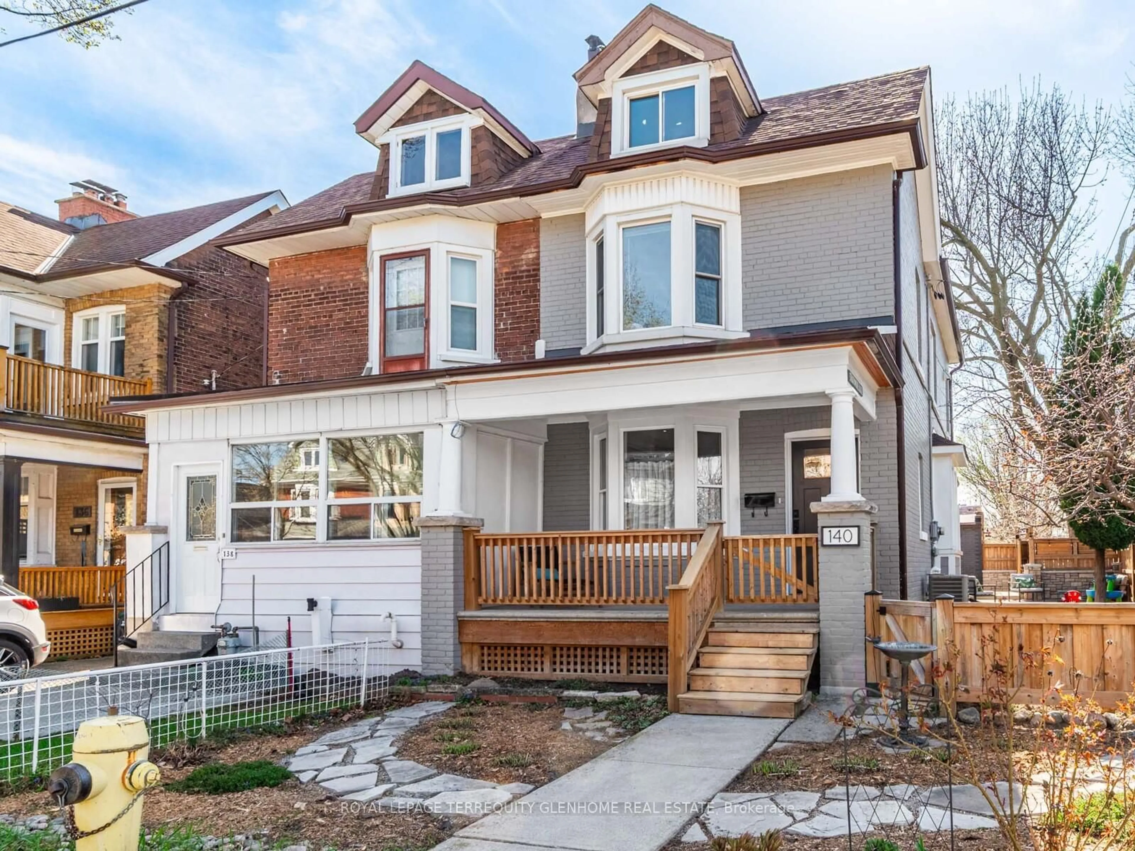 Home with brick exterior material, street for 140 Monarch Park Ave, Toronto Ontario M4J 4R4