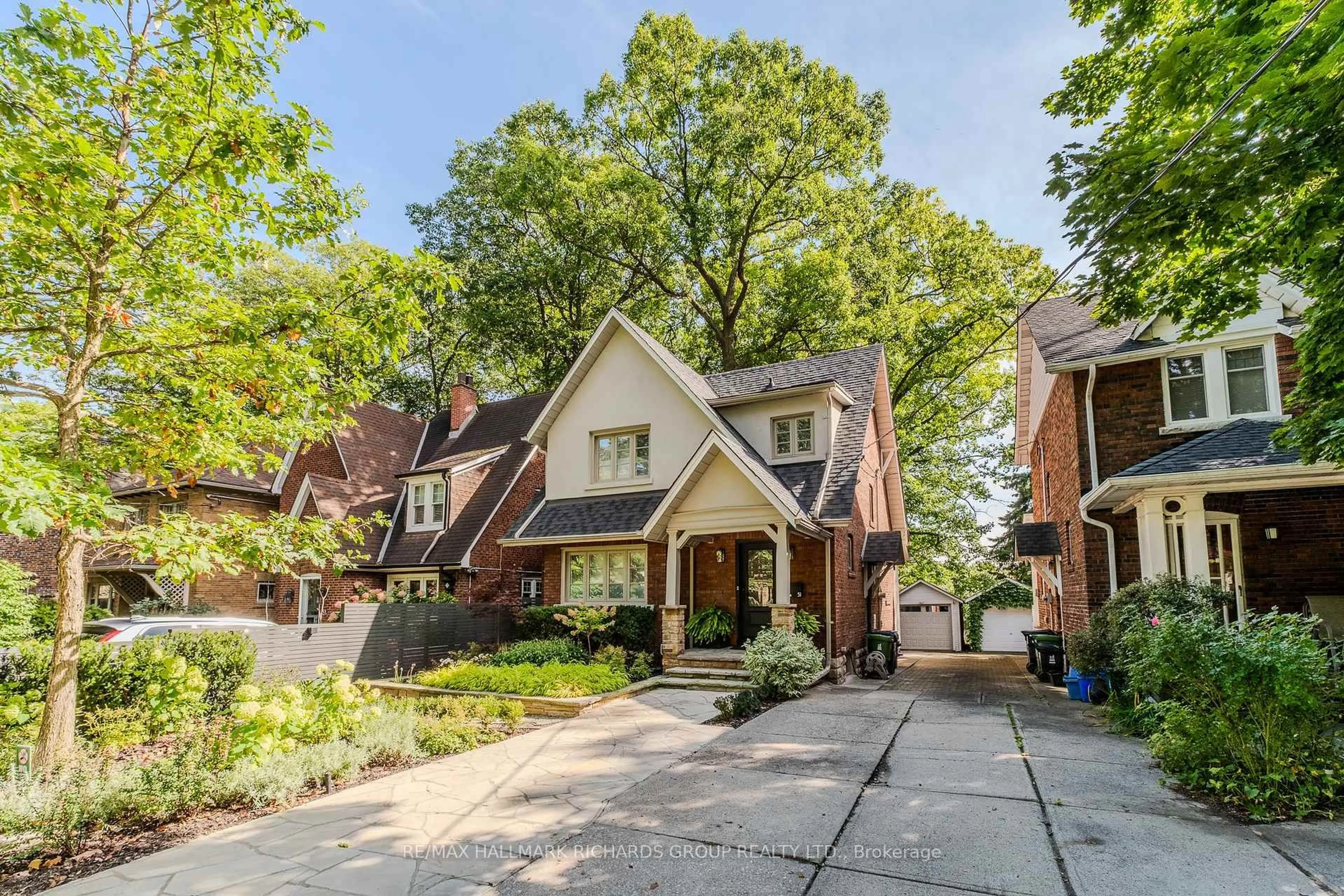 Home with brick exterior material, street for 51 Beaufort Rd, Toronto Ontario M4E 1M8