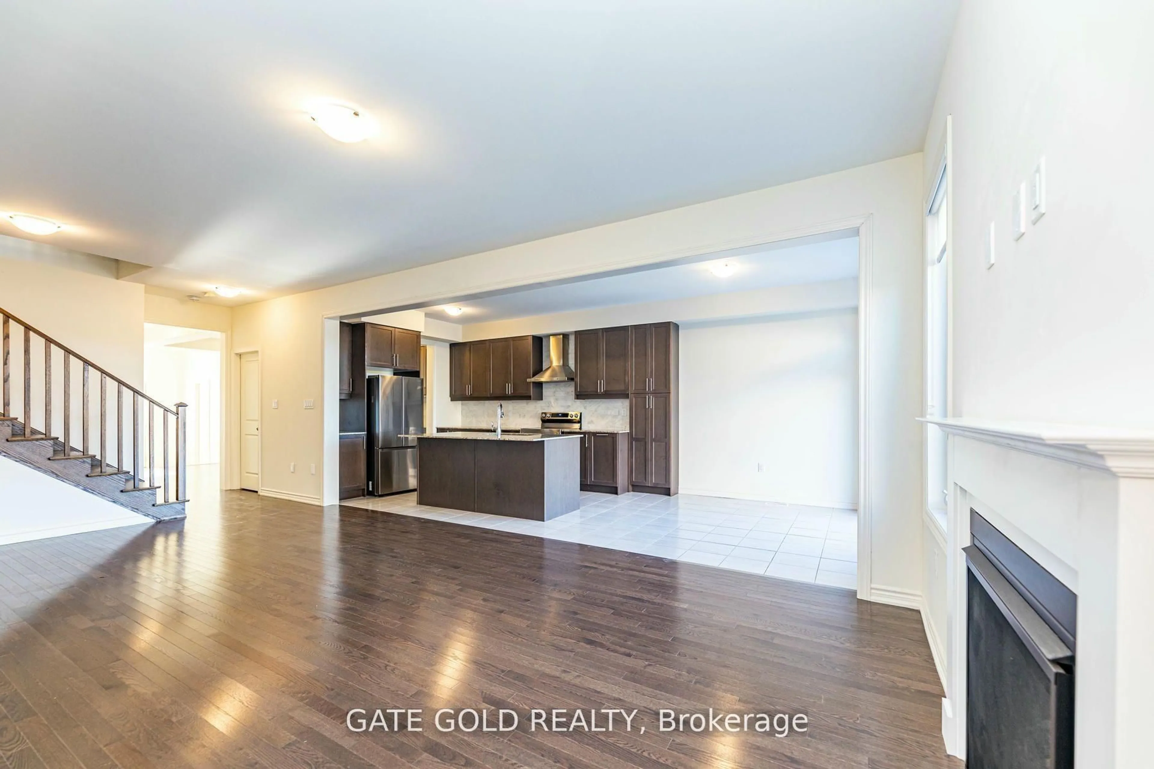 Open concept kitchen, wood/laminate floor for 861 Rexton Dr, Oshawa Ontario L1L 0V1