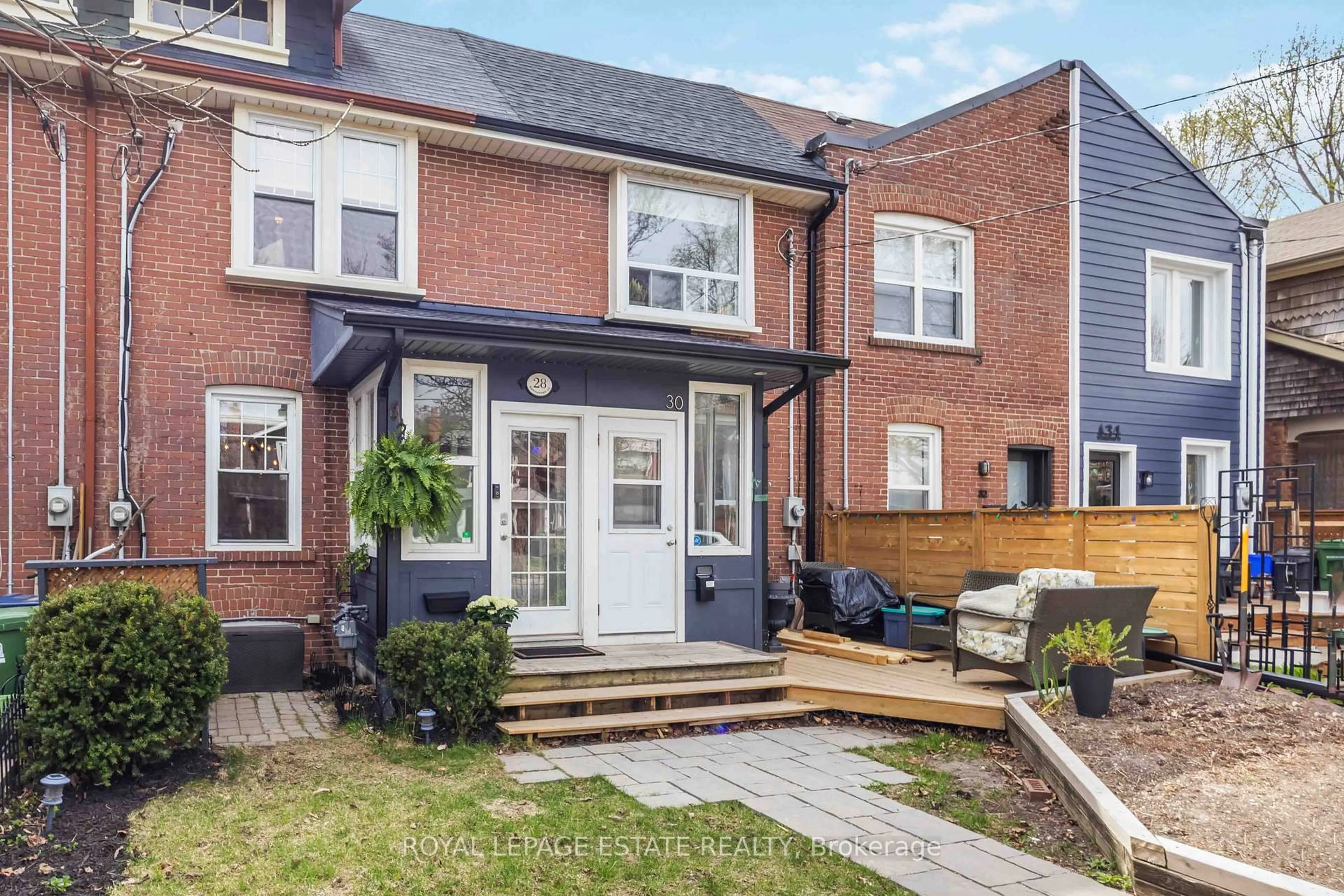 Home with brick exterior material, street for 28 Hannaford St, Toronto Ontario M4E 3G7