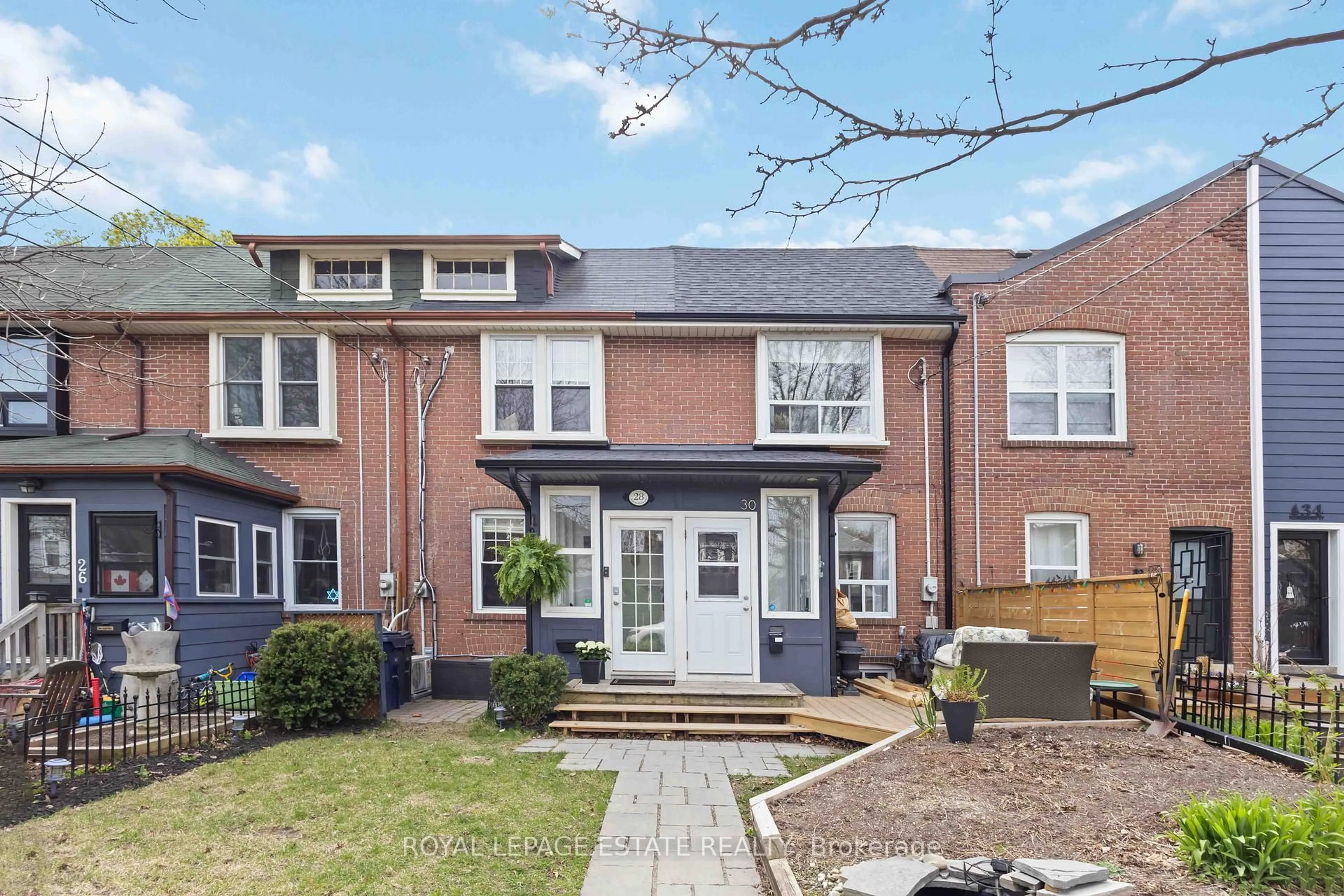 Home with brick exterior material, street for 28 Hannaford St, Toronto Ontario M4E 3G7