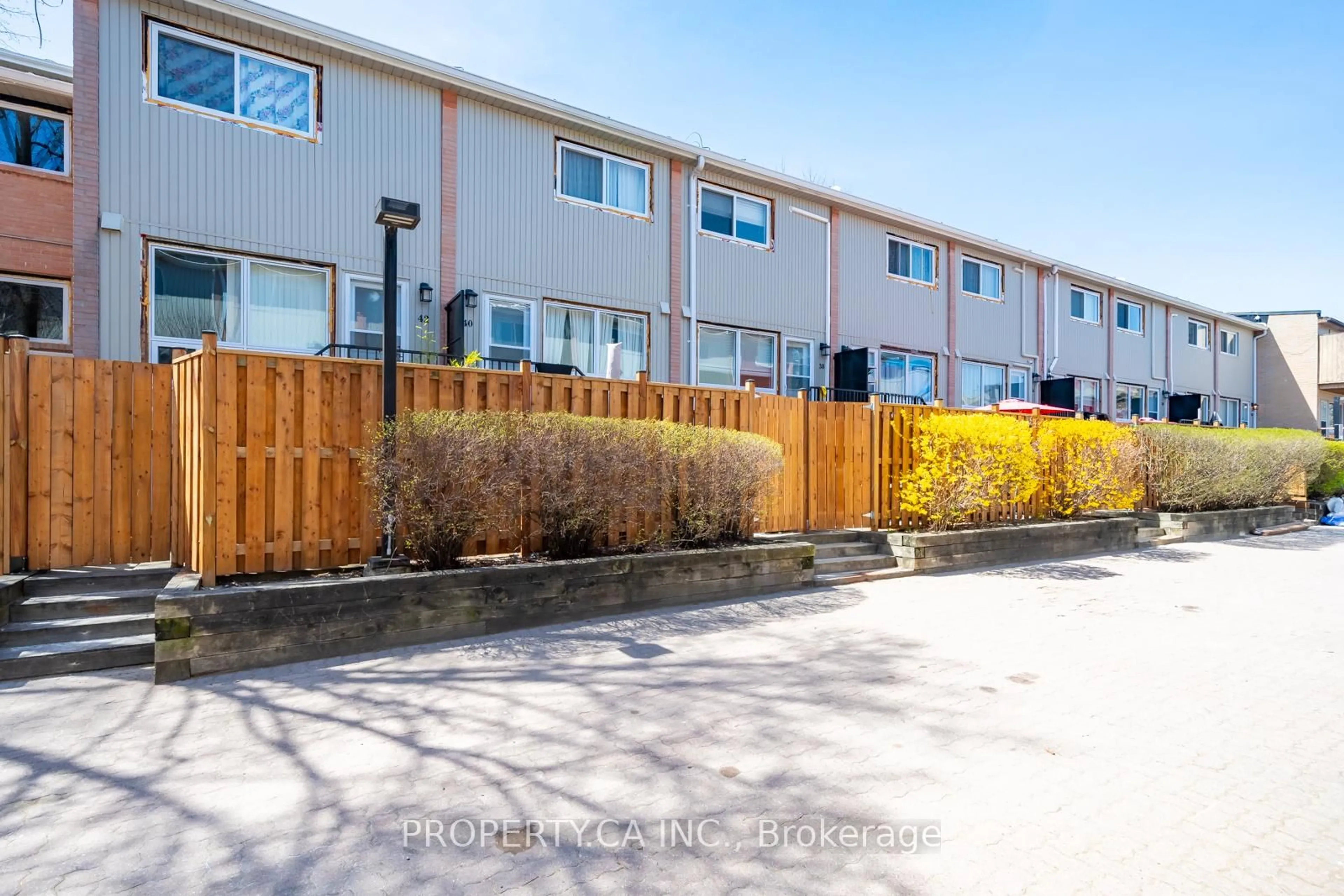 A pic from outside/outdoor area/front of a property/back of a property/a pic from drone, street for 1209 Queen St #30, Toronto Ontario M4M 3H4
