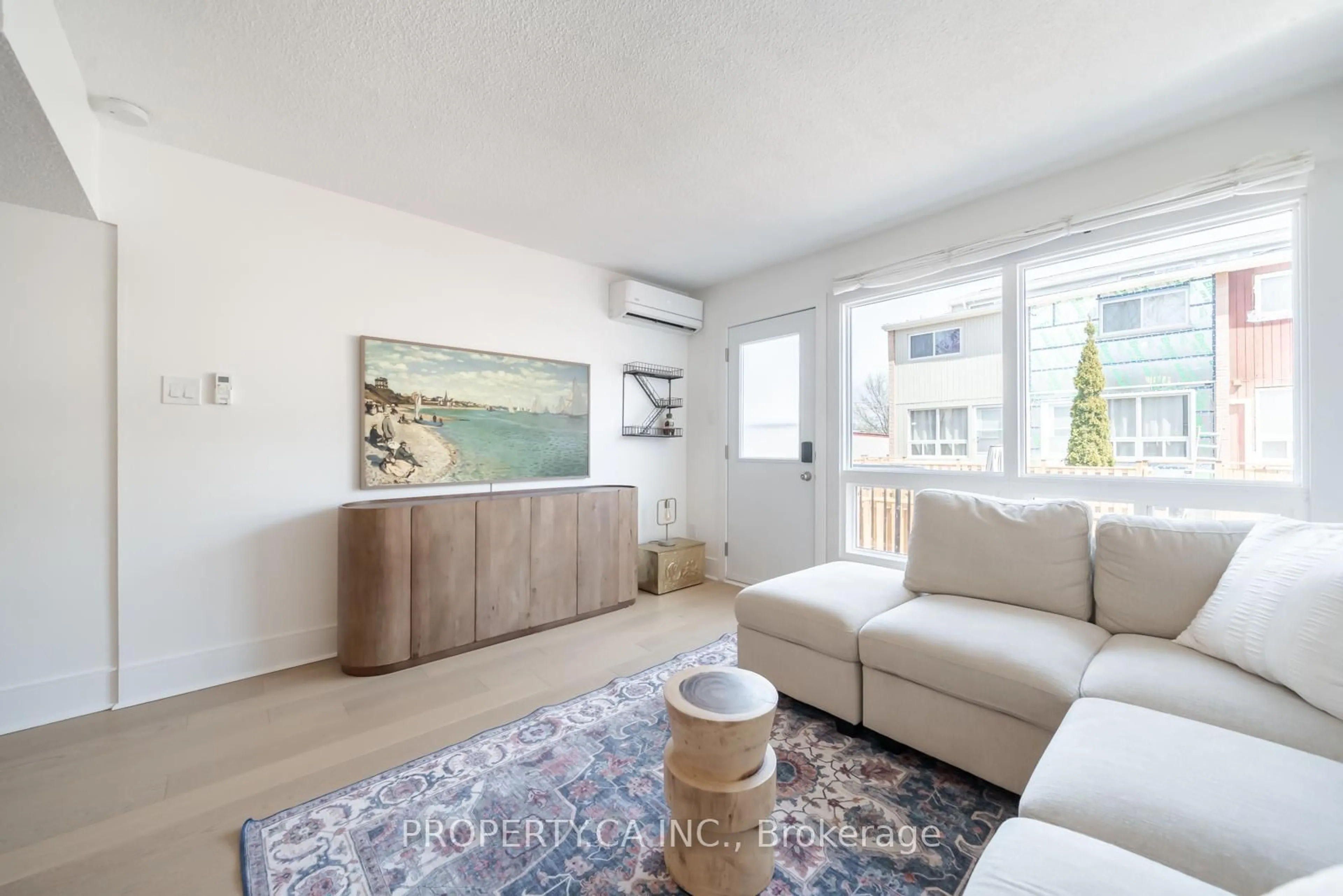 Living room with furniture, unknown for 1209 Queen St #30, Toronto Ontario M4M 3H4
