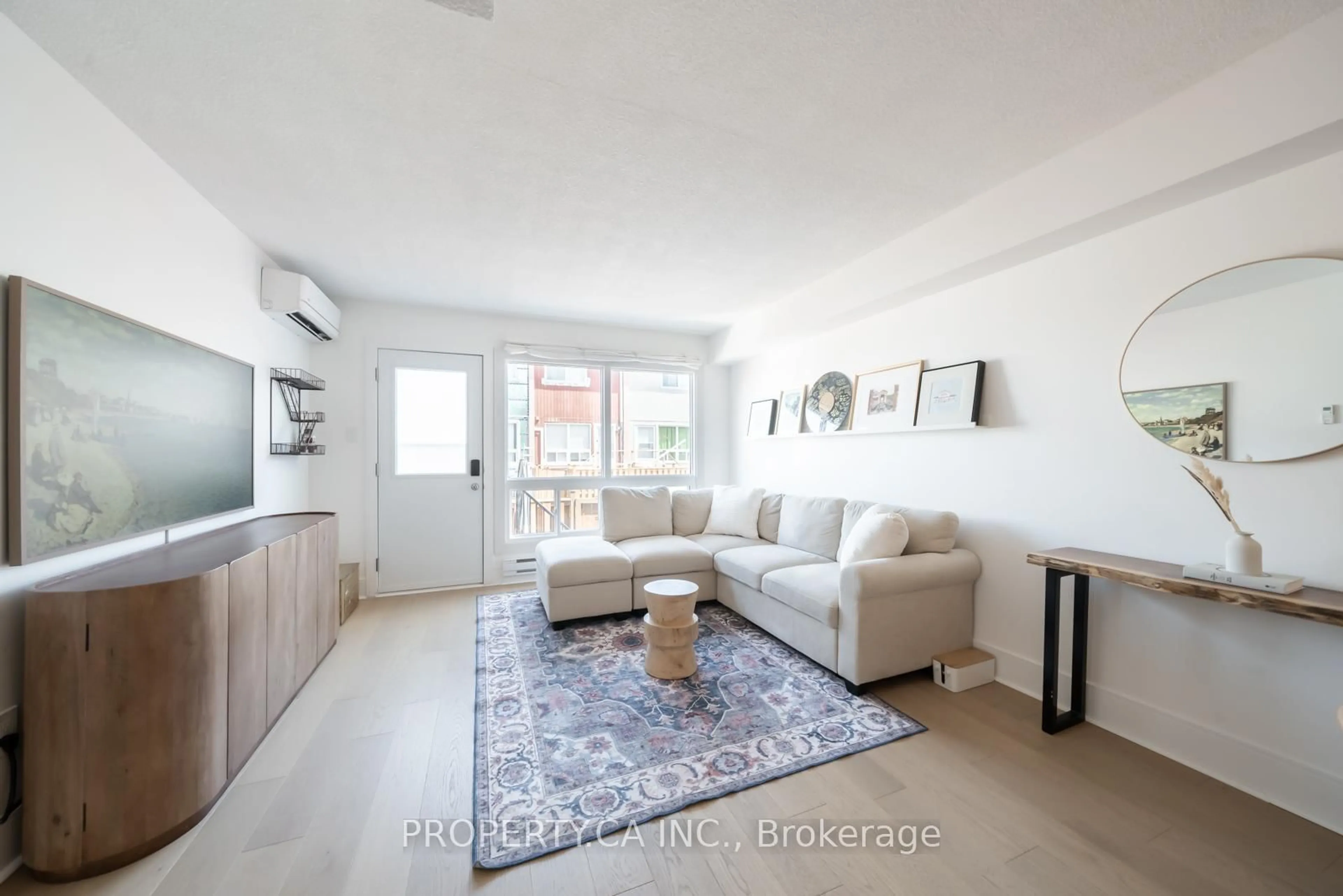 Living room with furniture, unknown for 1209 Queen St #30, Toronto Ontario M4M 3H4