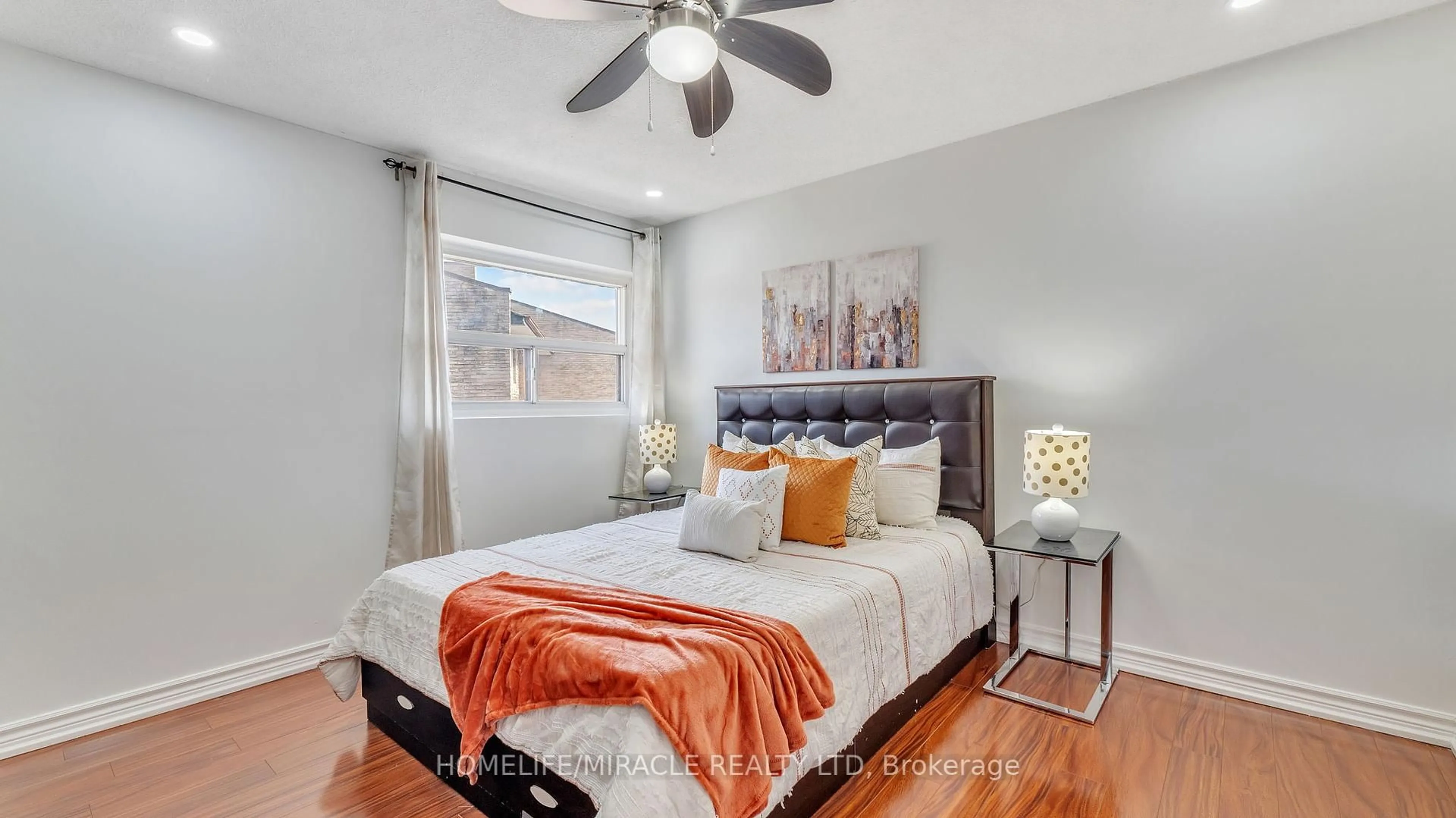 Bedroom with bed, wood/laminate floor for 91 Muir Dr #78, Toronto Ontario M1M 3T7