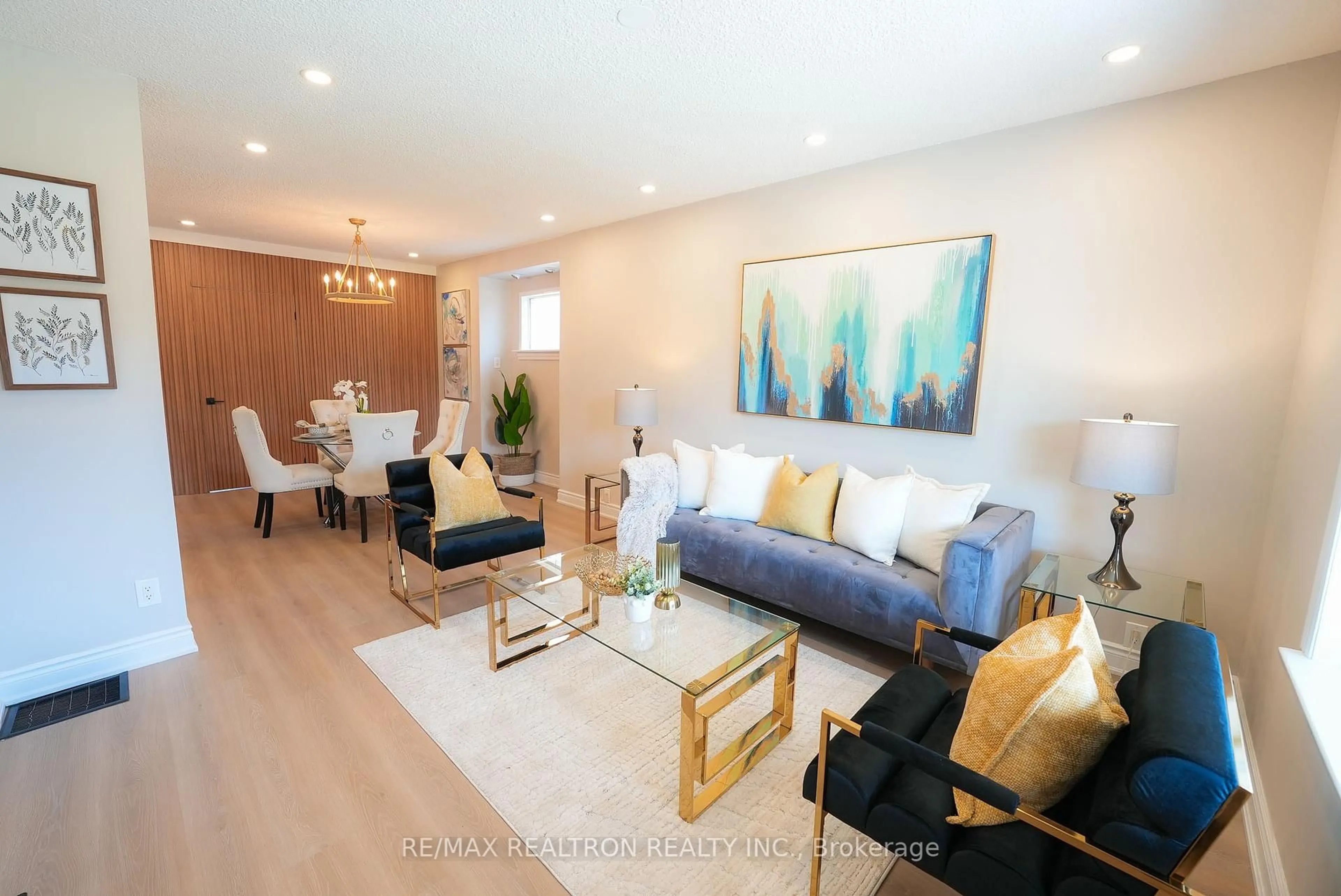 Living room with furniture, wood/laminate floor for 34 Westmoreland Ave, Oshawa Ontario L1G 2M8