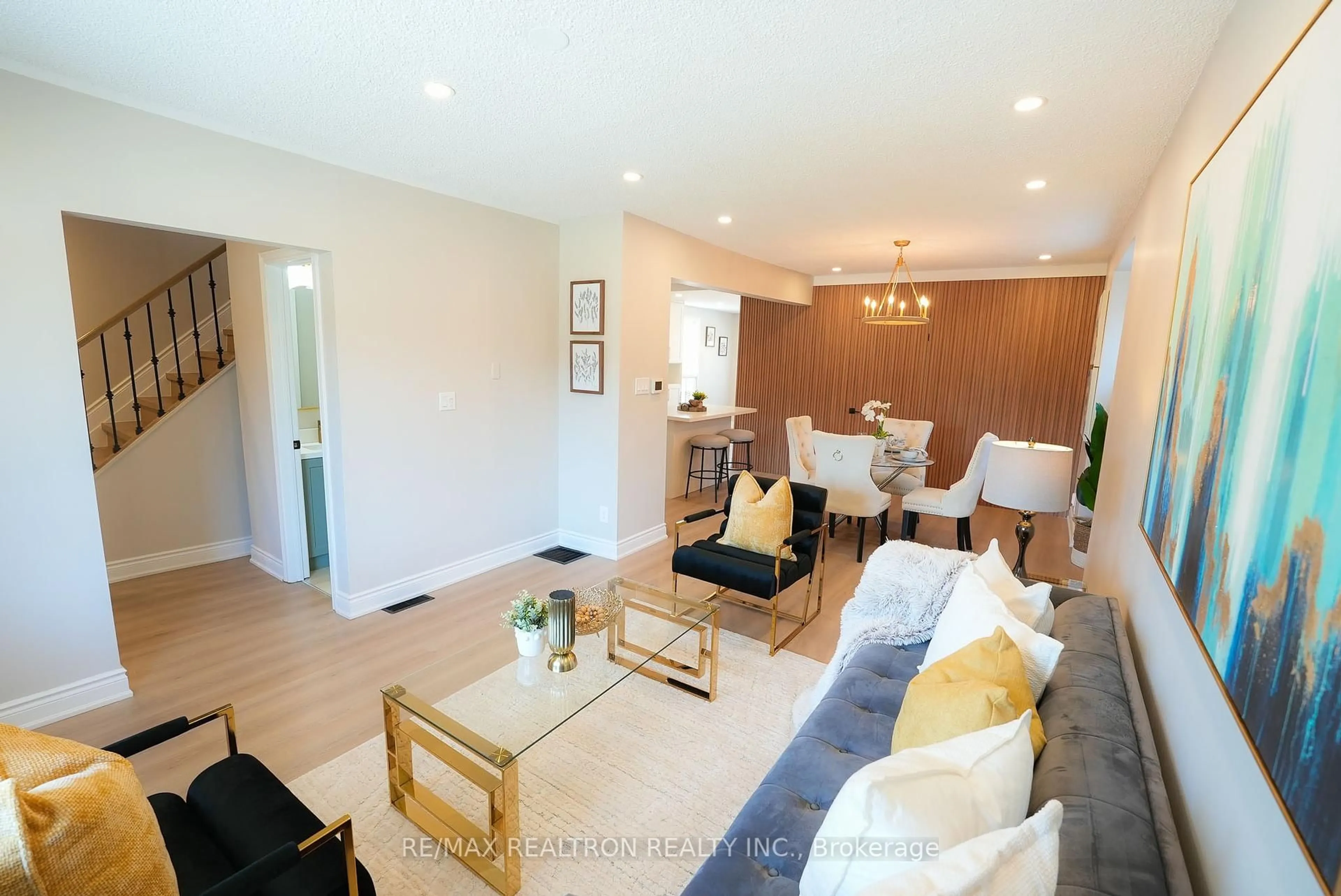 Living room with furniture, wood/laminate floor for 34 Westmoreland Ave, Oshawa Ontario L1G 2M8