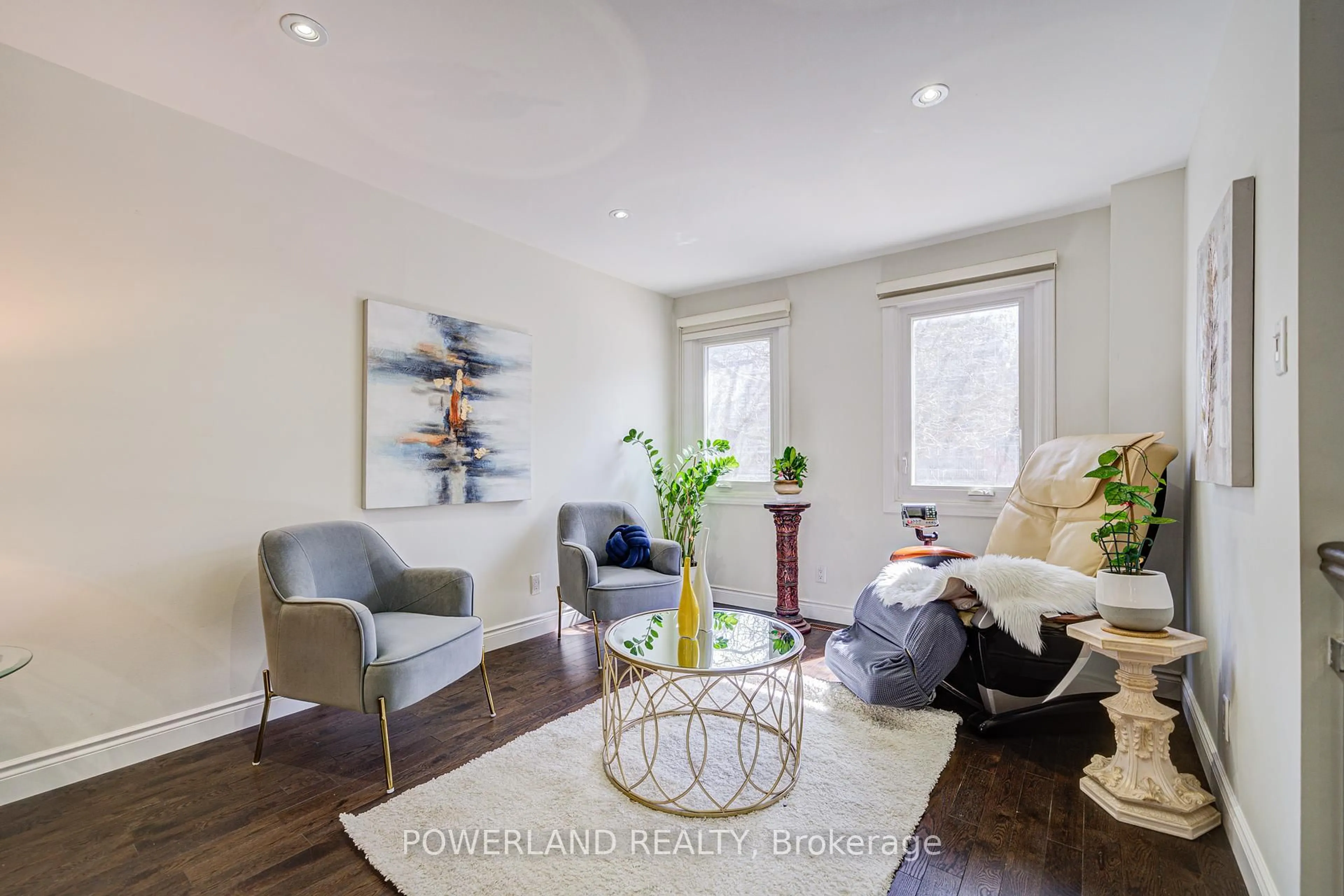 Living room with furniture, wood/laminate floor for 20 Coatsworth Cres, Toronto Ontario M4C 5P6