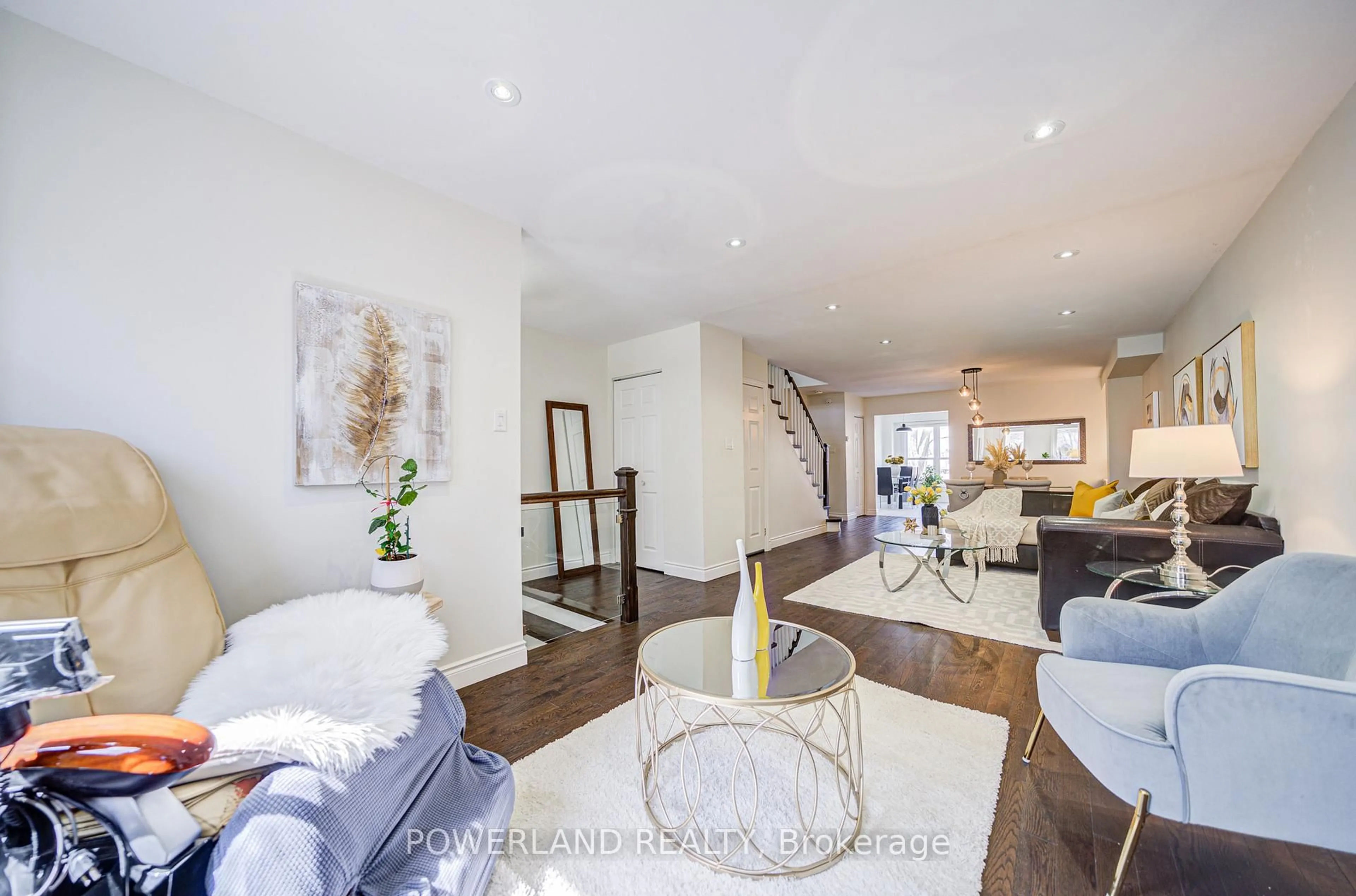 Living room with furniture, wood/laminate floor for 20 Coatsworth Cres, Toronto Ontario M4C 5P6