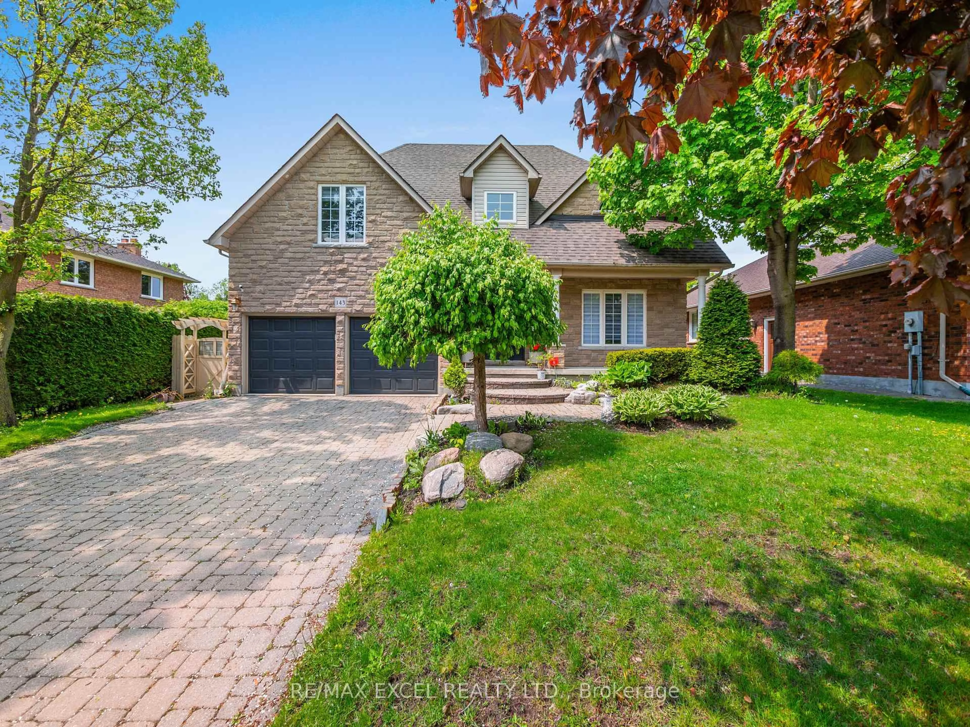 Home with brick exterior material, street for 143 Samac Tr, Oshawa Ontario L1G 7V9