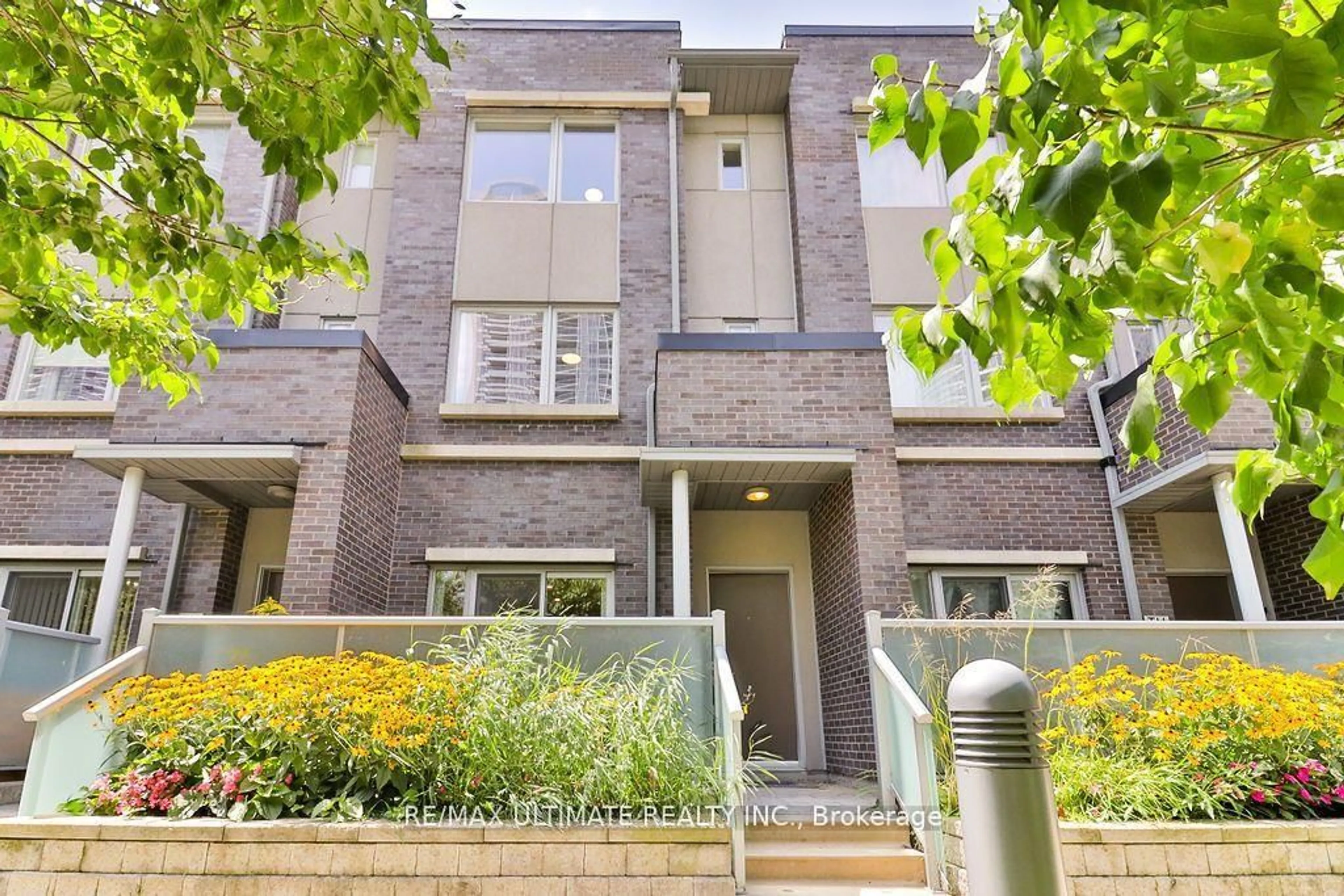Home with brick exterior material, street for 330 Village Green Sq #TH 06, Toronto Ontario M1S 0L1