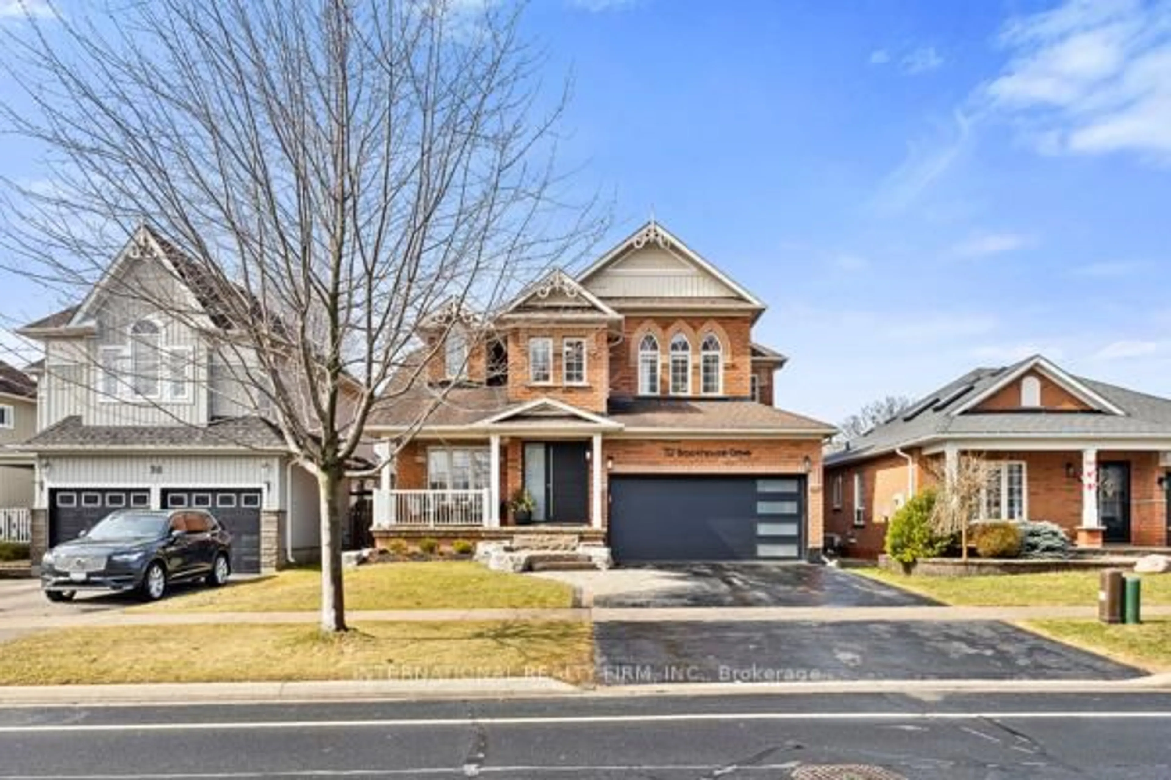 Home with brick exterior material, street for 32 Brookhouse Dr, Clarington Ontario L1B 1N8