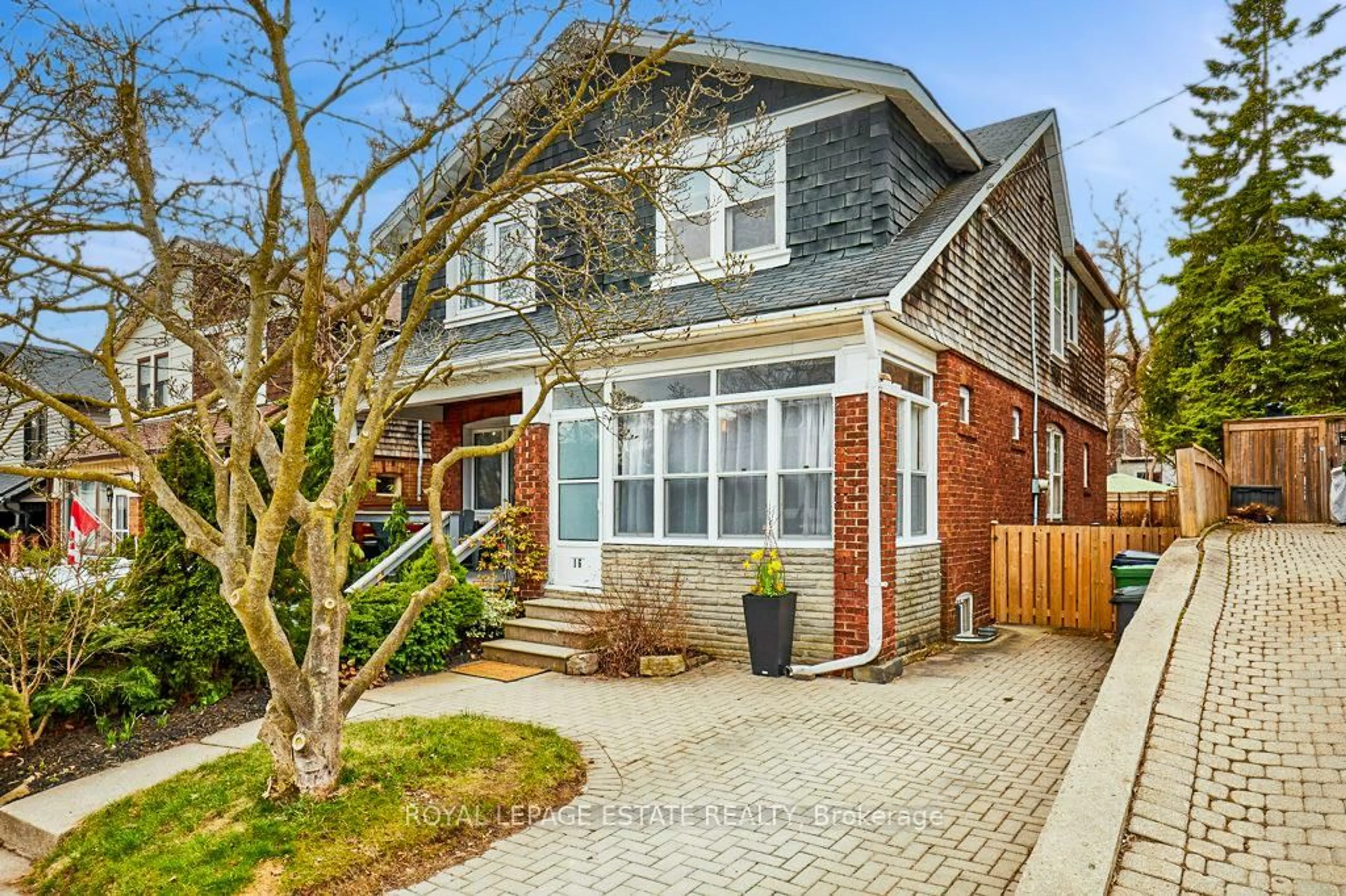 Home with brick exterior material, street for 16 Firstbrooke Rd, Toronto Ontario M4E 2L1