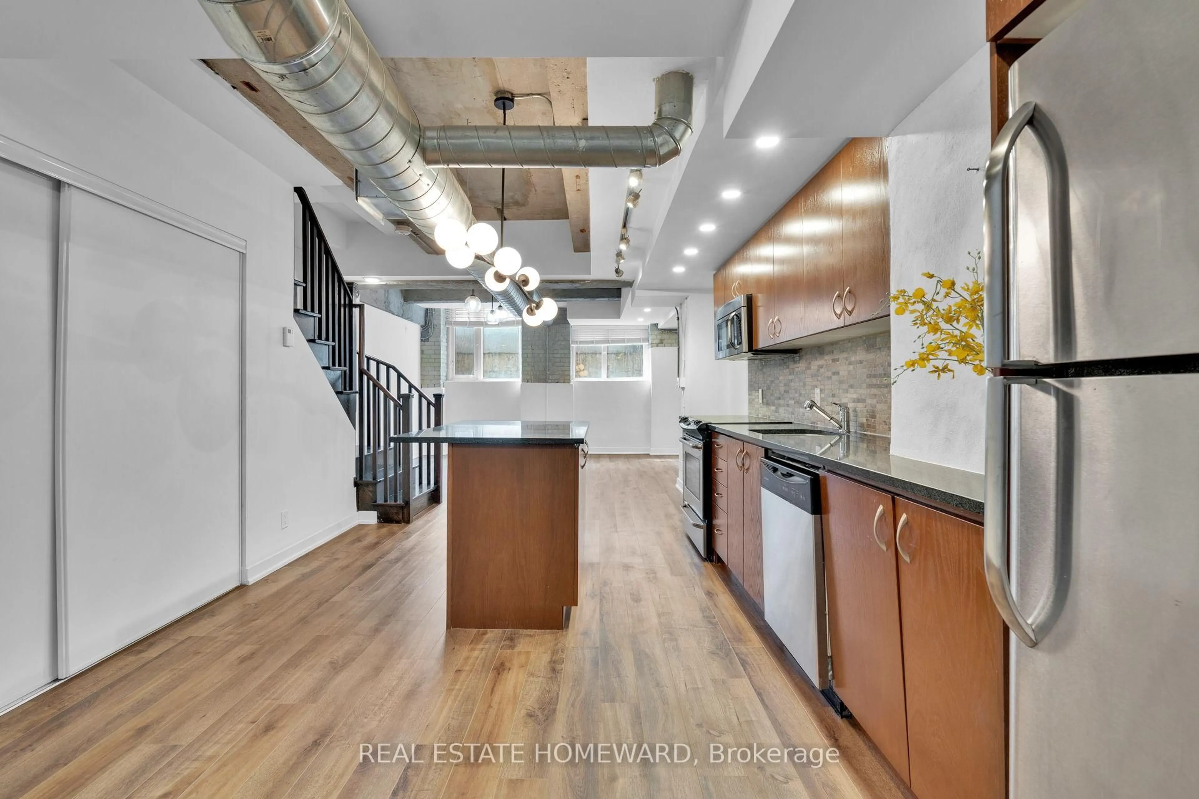 Open concept kitchen, unknown for 201 Carlaw Ave #128, Toronto Ontario M4M 2S3