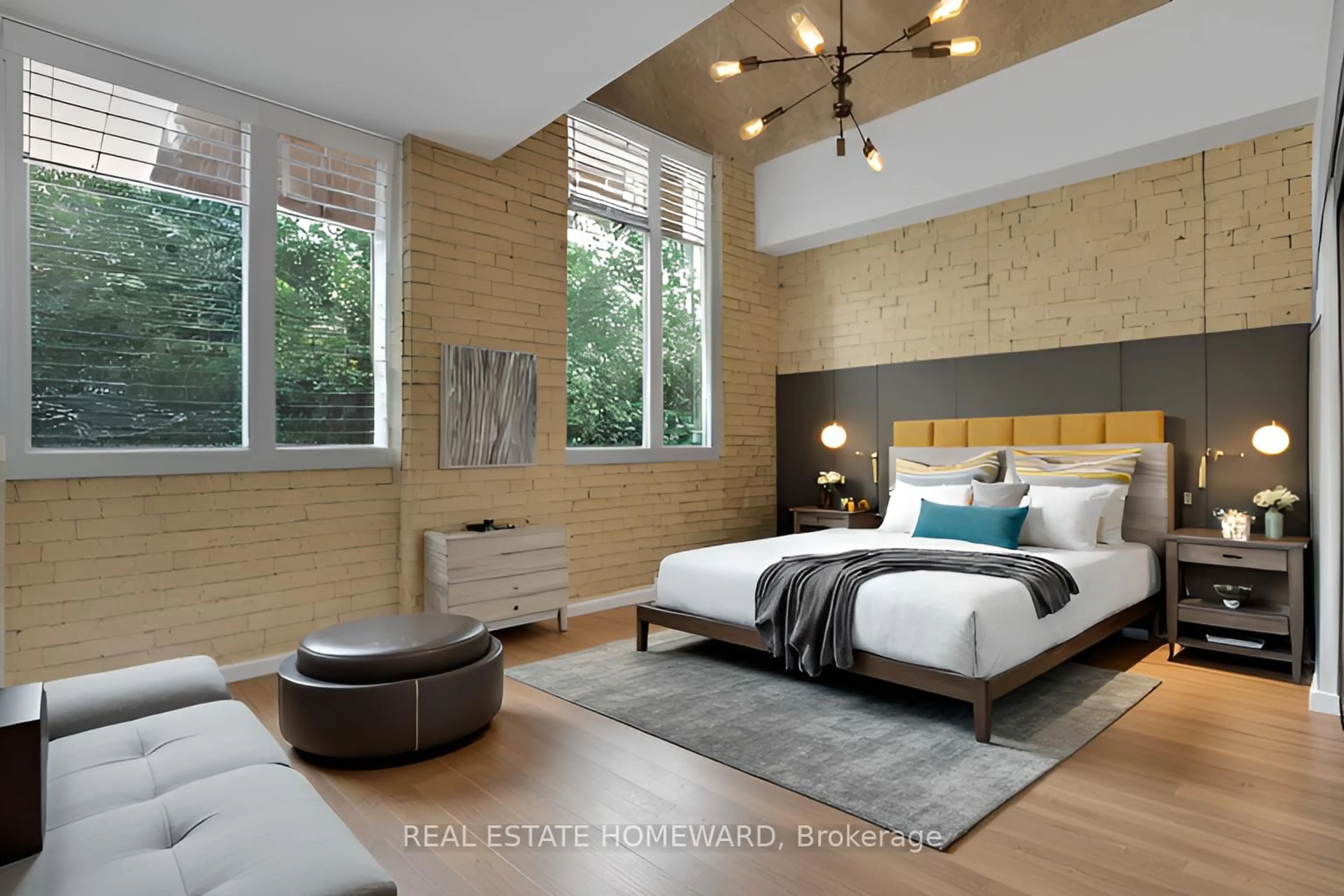 Bedroom with bed, wood/laminate floor for 201 Carlaw Ave #128, Toronto Ontario M4M 2S3