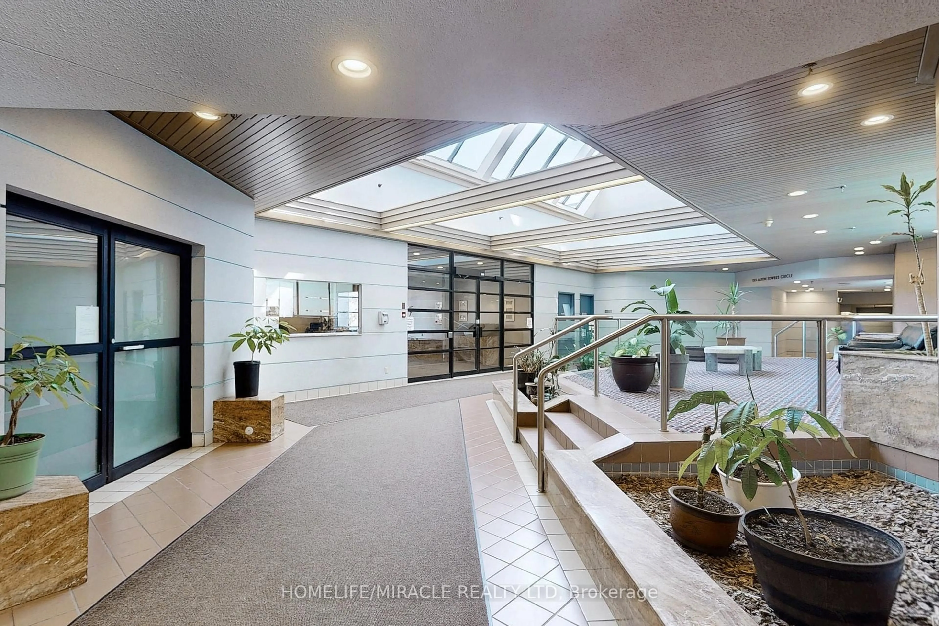 Indoor foyer for 160 Alton Towers Circ #209, Toronto Ontario M1V 4X8