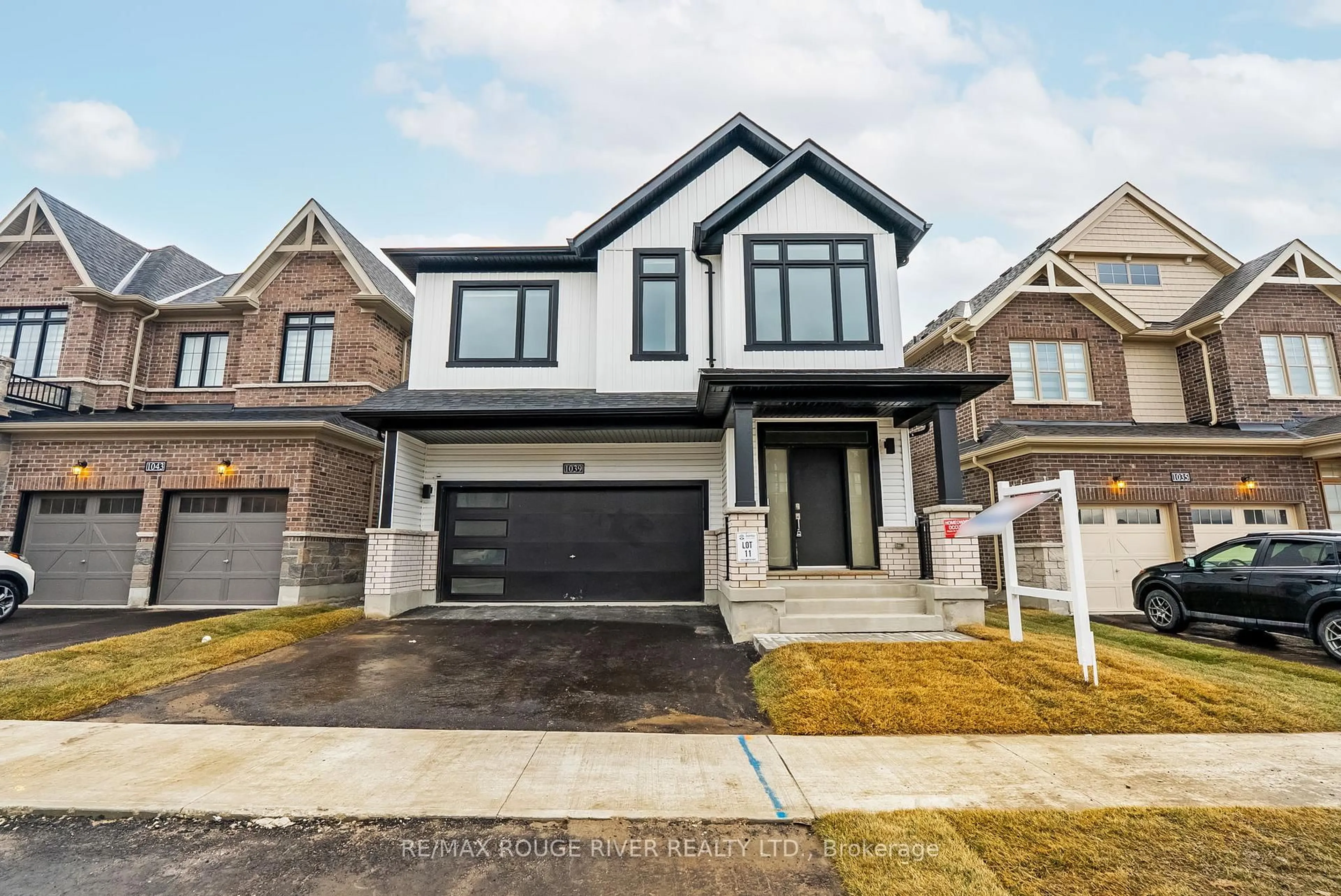 Home with brick exterior material, street for 1039 Thompson Dr, Oshawa Ontario L1L 0V6