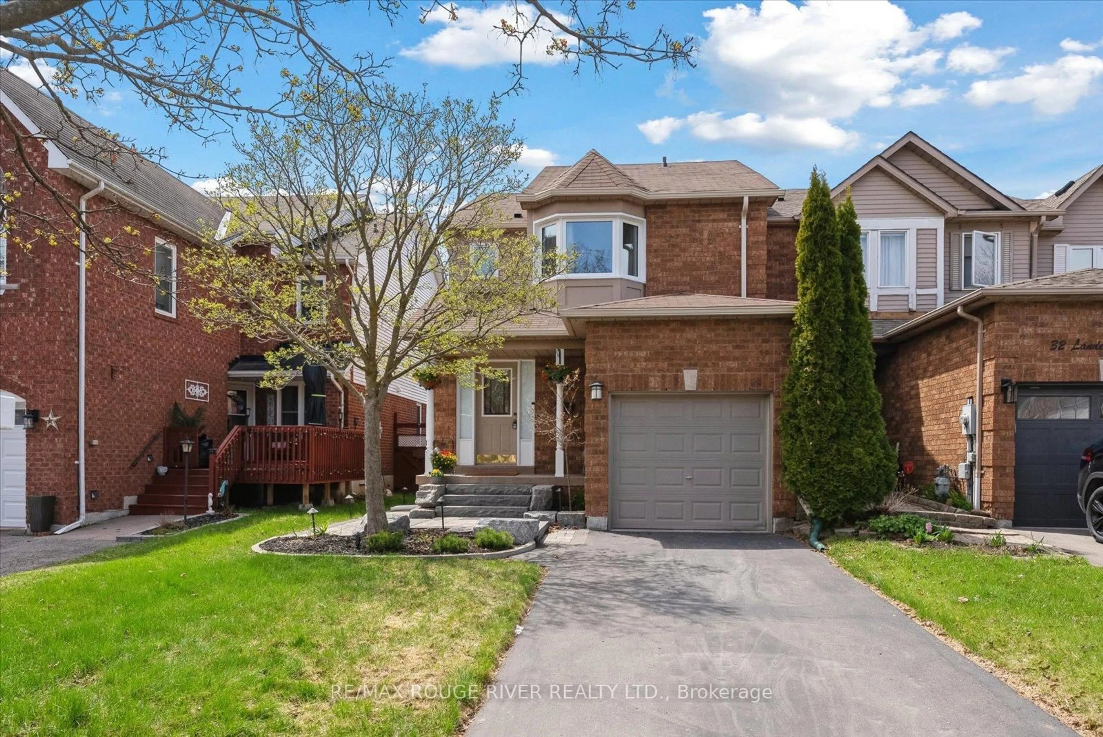 Home with brick exterior material, street for 30 Landerville Lane, Clarington Ontario L1C 4W8