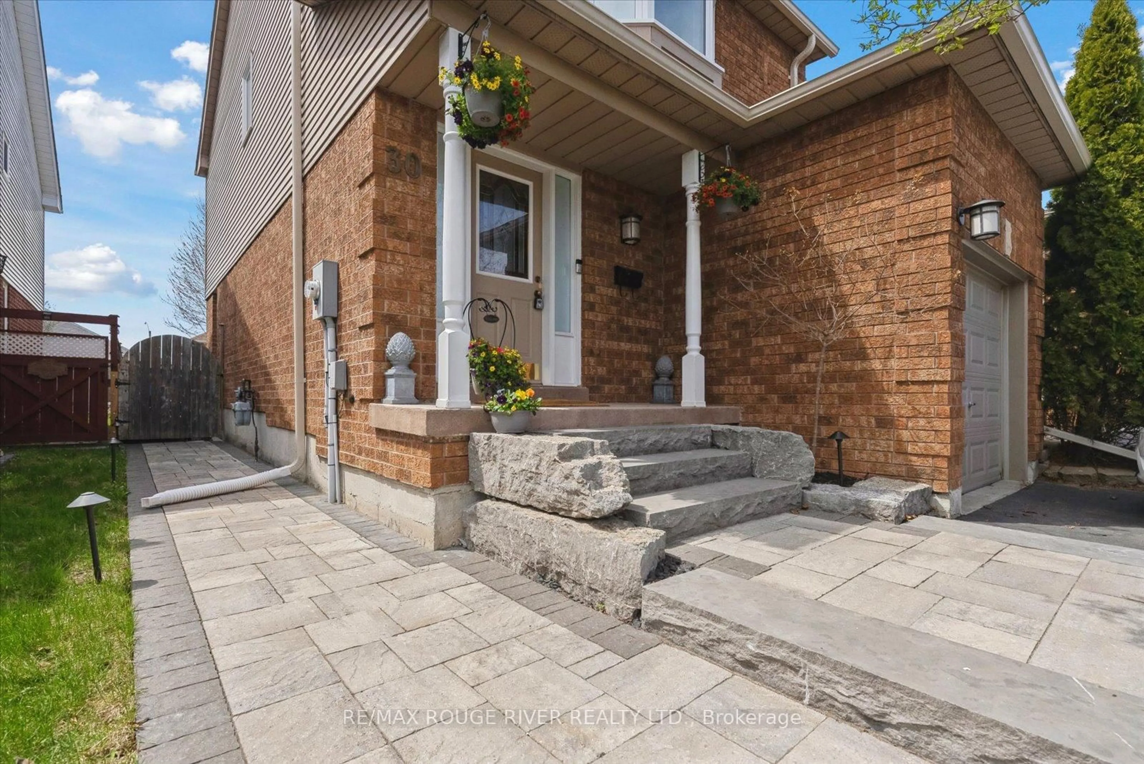 Home with brick exterior material, street for 30 Landerville Lane, Clarington Ontario L1C 4W8