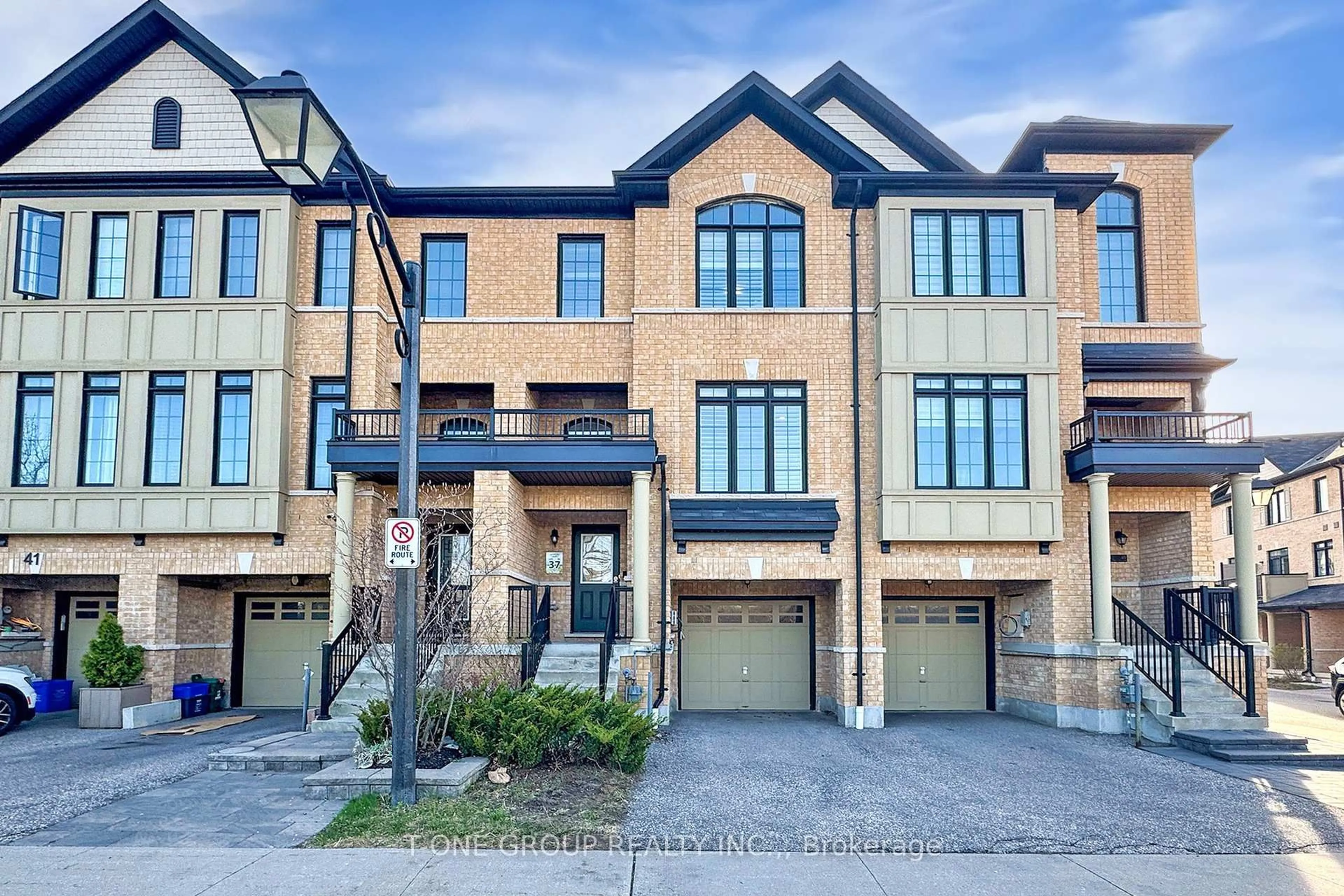 Home with brick exterior material, street for 37 Quarrie Lane, Ajax Ontario L1T 0N1