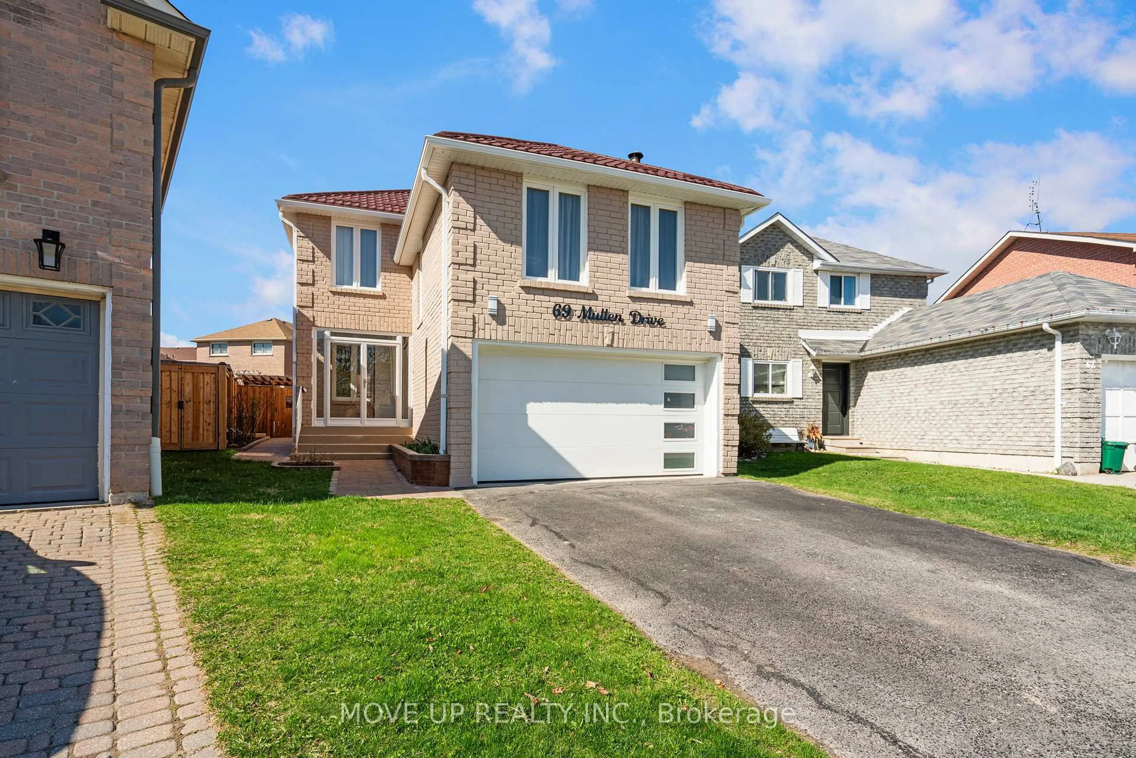 A pic from outside/outdoor area/front of a property/back of a property/a pic from drone, street for 69 Mullen Dr, Ajax Ontario L1T 2B2