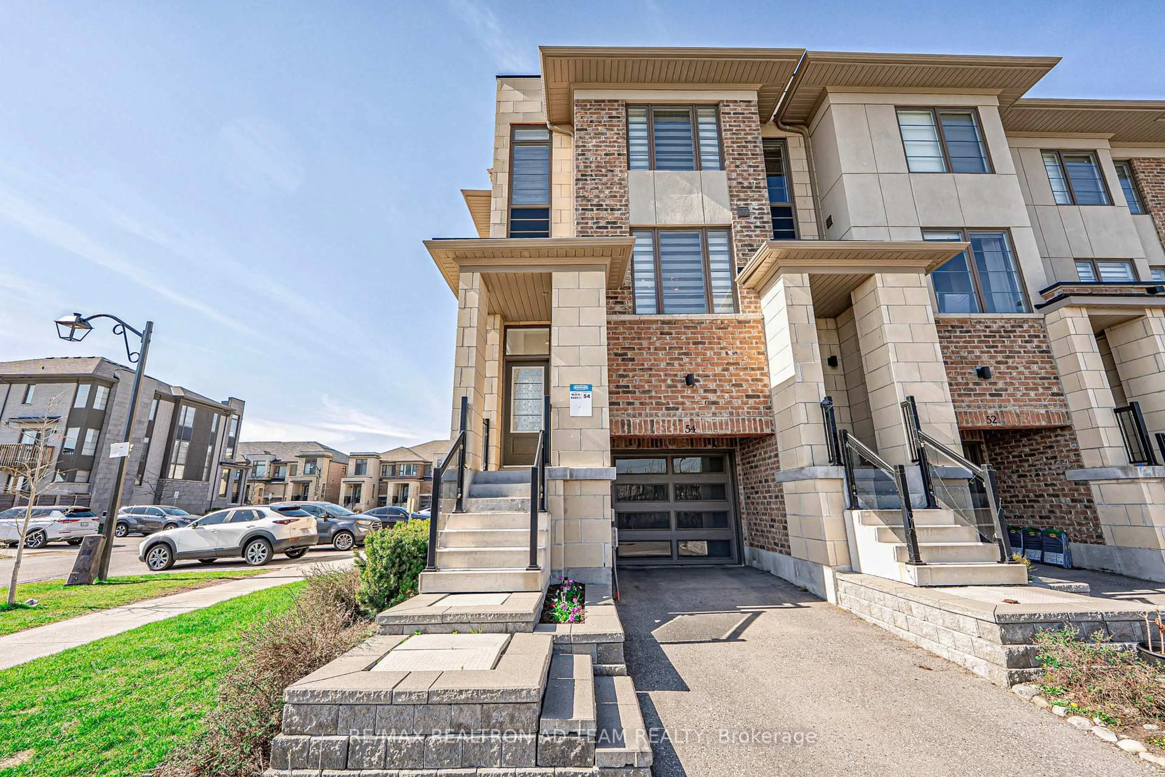 Home with brick exterior material, street for 54 Shawfield Way, Whitby Ontario L1R 0N8