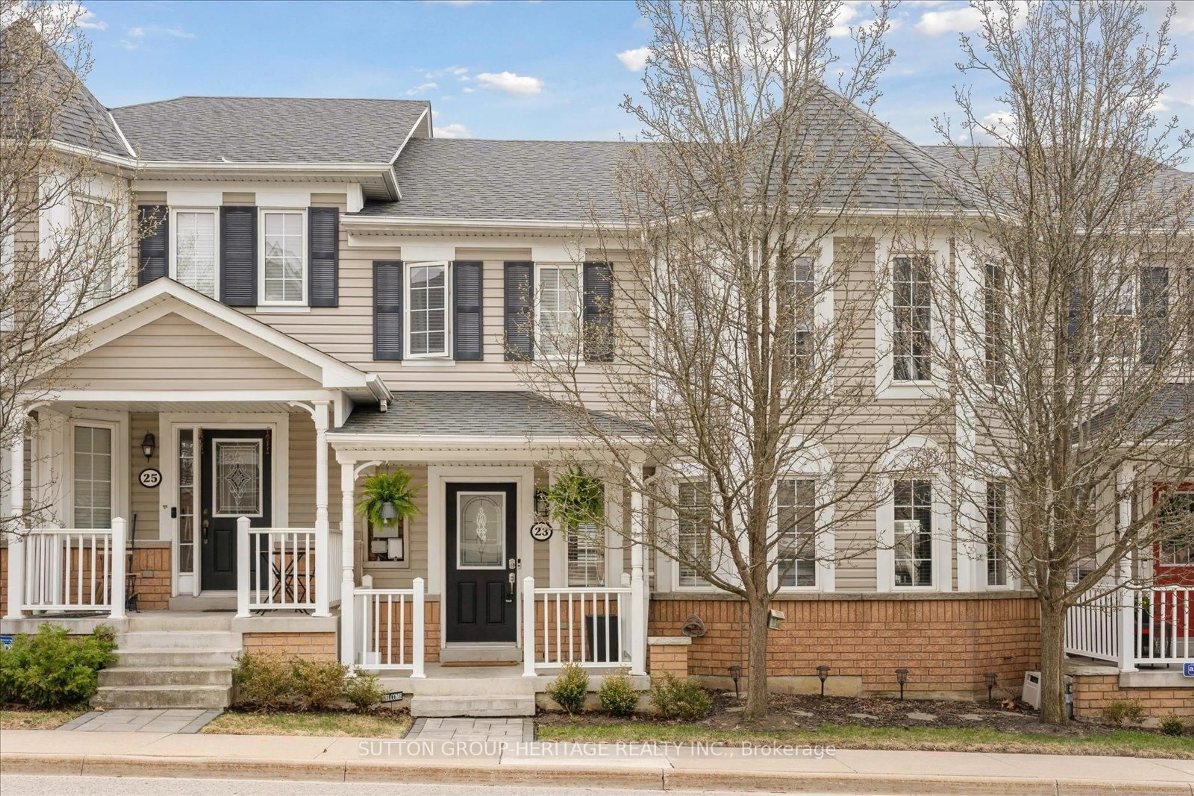 Home with brick exterior material, street for 23 Vallance Way #25, Whitby Ontario L1M 0E7