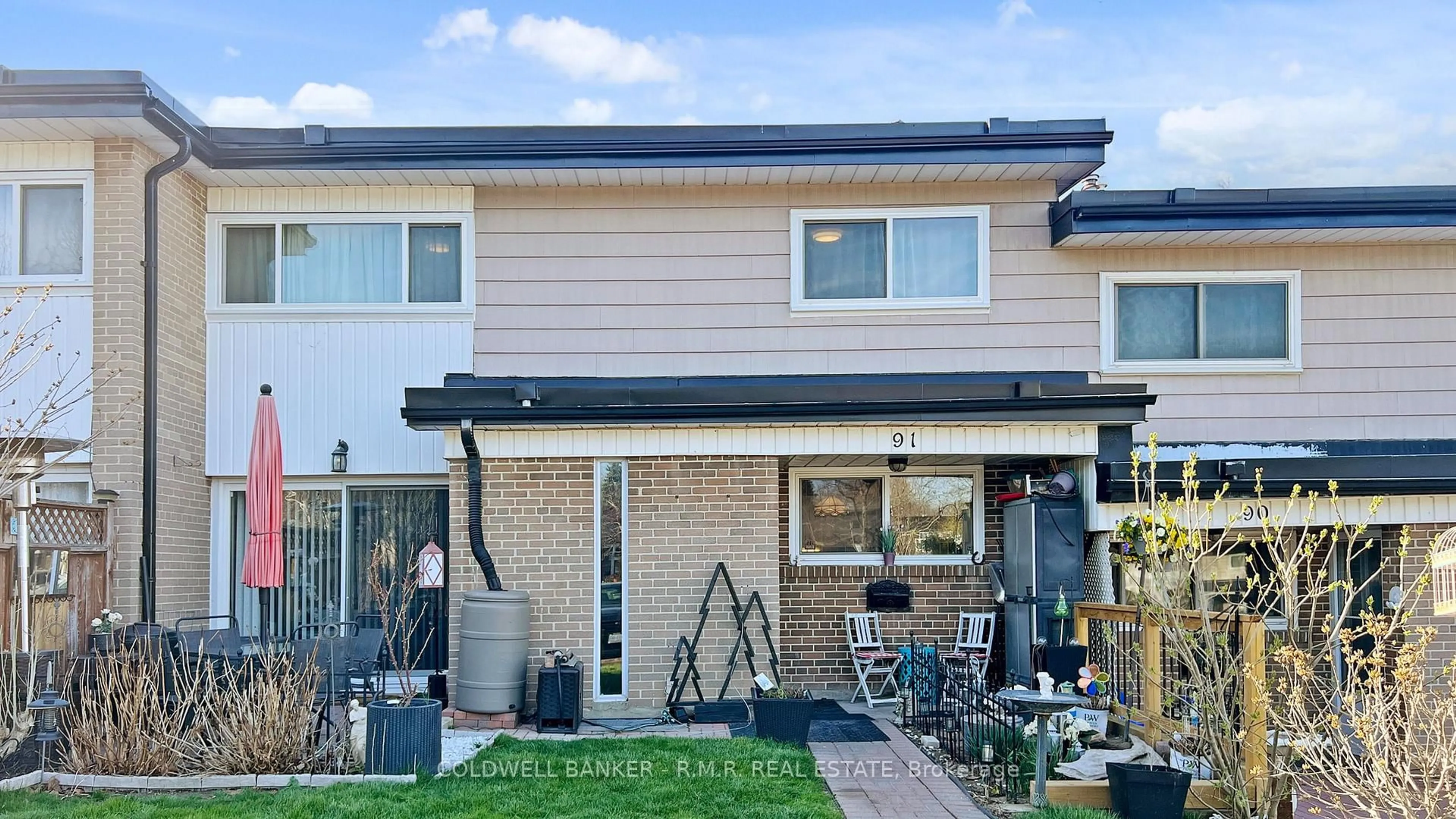 Home with brick exterior material, street for 925 Bayly St #91, Pickering Ontario L1W 1L4