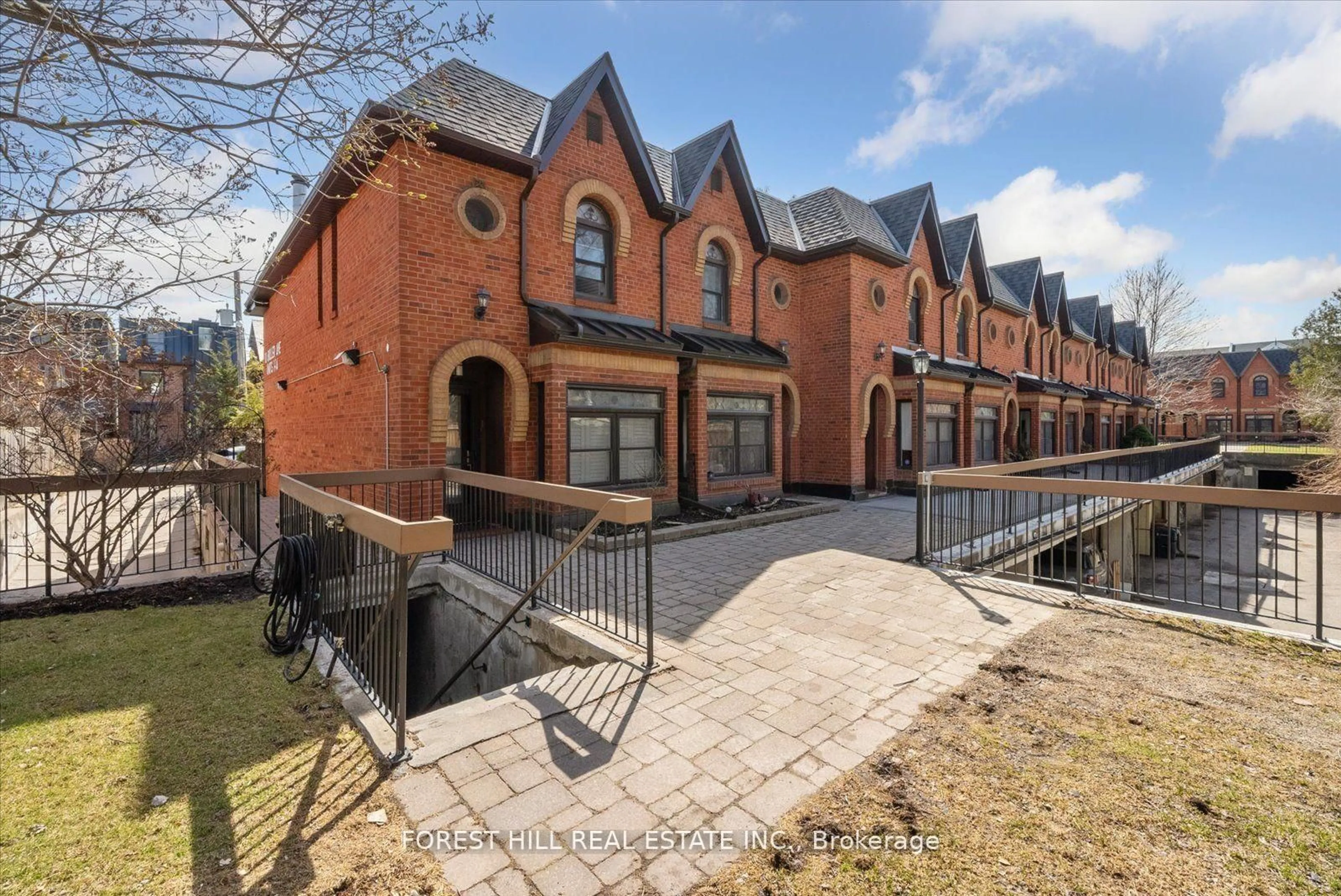 A pic from outside/outdoor area/front of a property/back of a property/a pic from drone, street for 10 Buller Ave #Th3, Toronto Ontario M4L 1C1