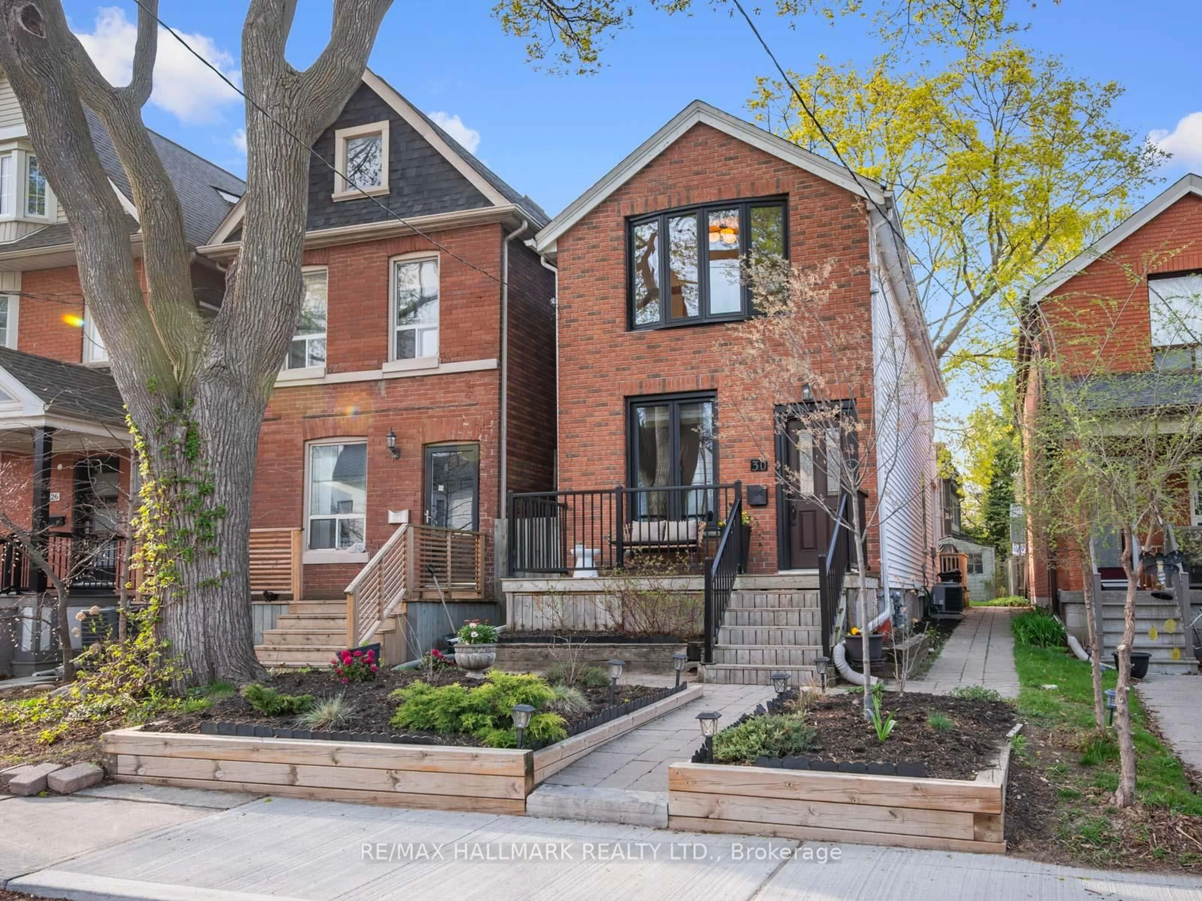 Home with brick exterior material, street for 30 Shudell Ave, Toronto Ontario M4J 1C7