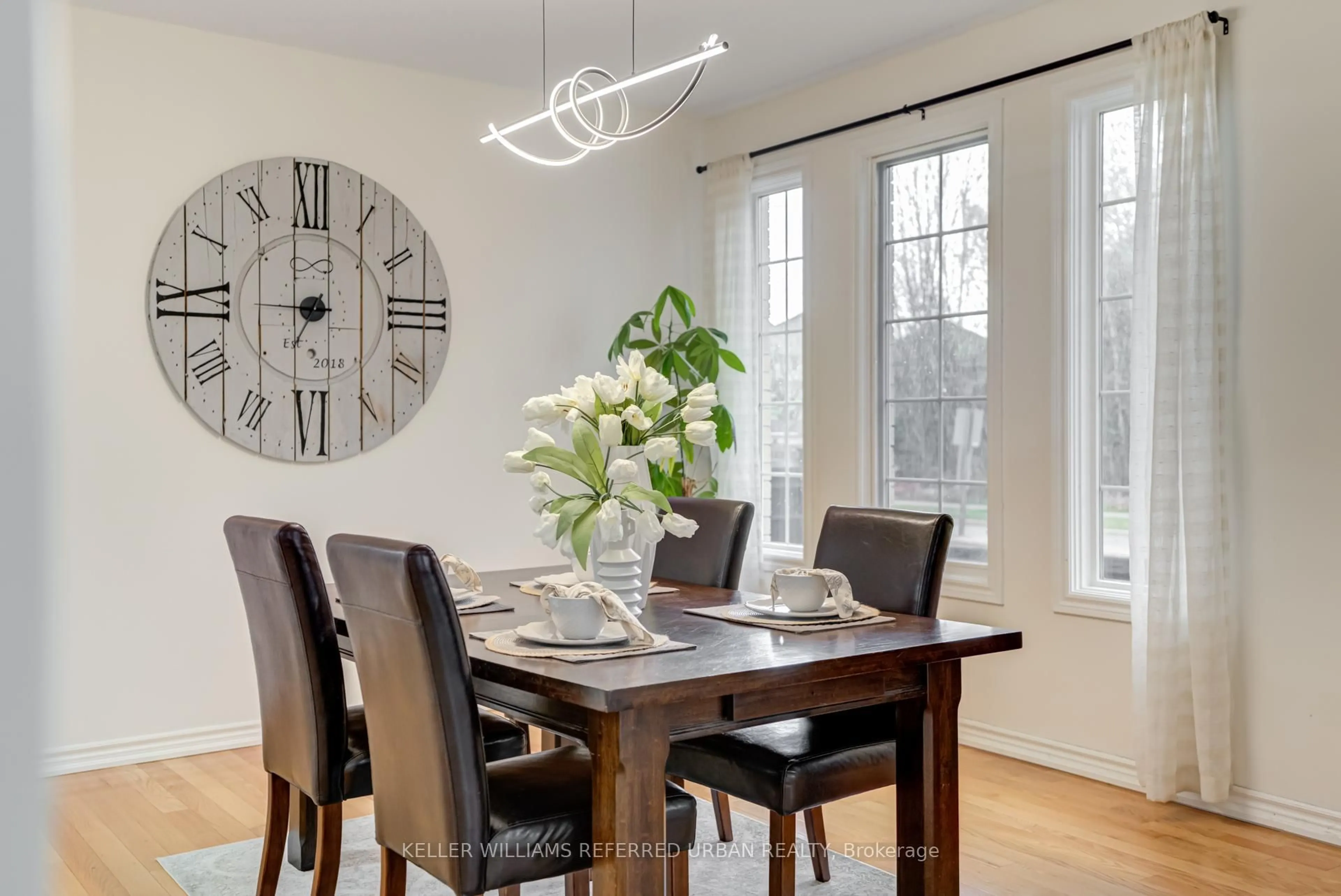 Dining room, wood/laminate floor for 2 Thistledown Cres, Whitby Ontario L1R 3P2