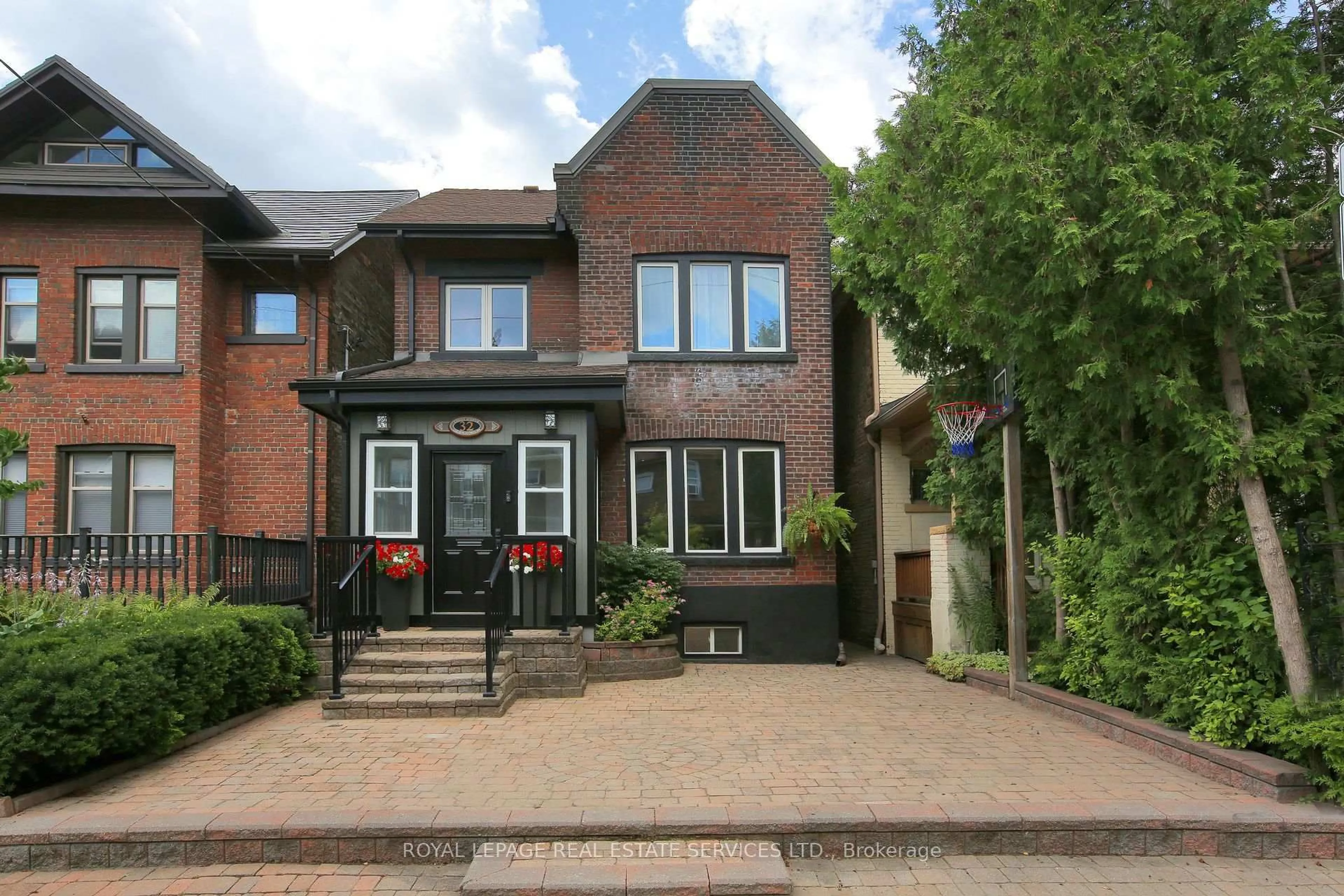 Home with brick exterior material, street for 32 Coady Ave, Toronto Ontario M4M 2Y8