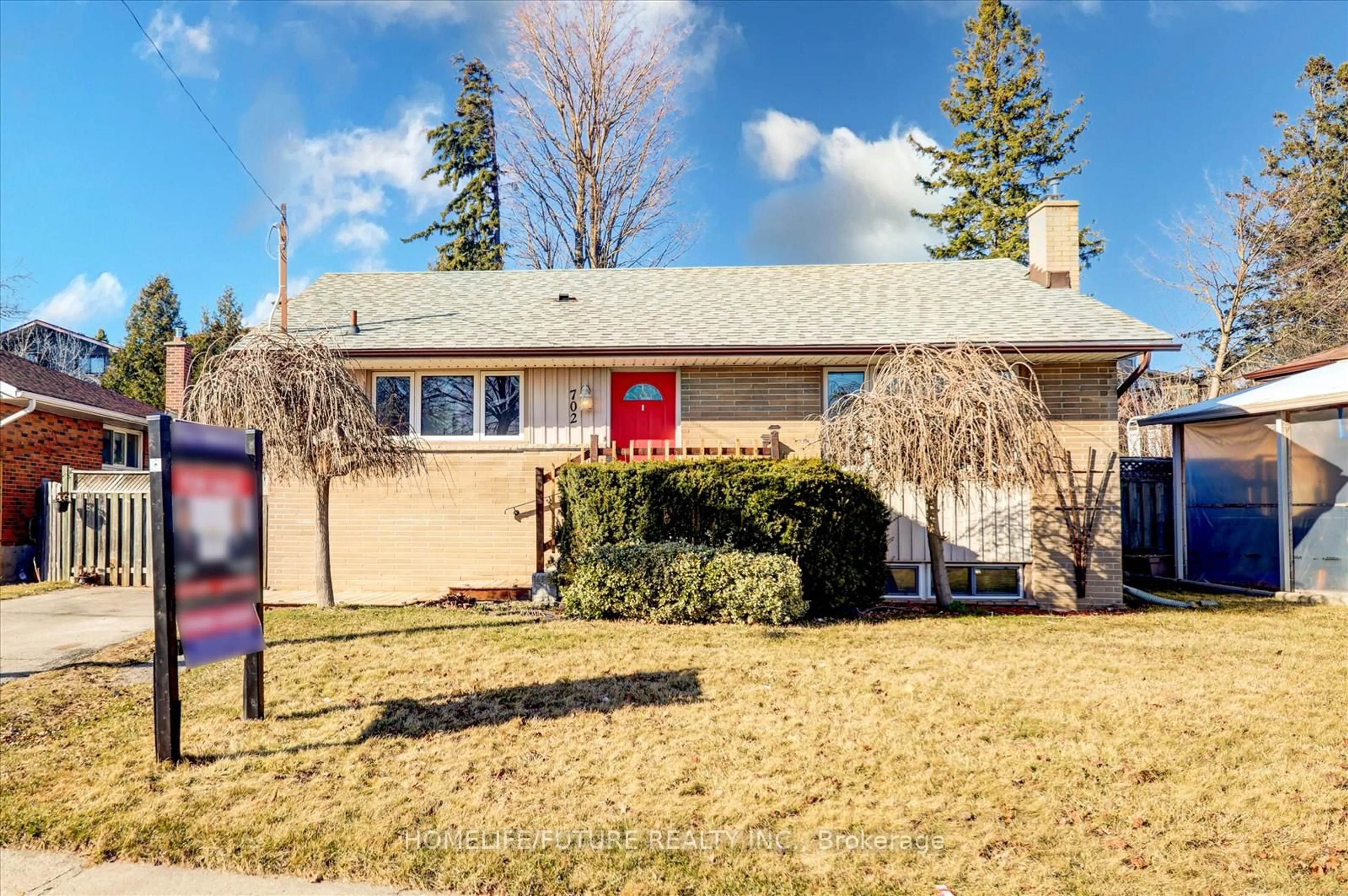 Home with vinyl exterior material, street for 702 Emerson Ave, Oshawa Ontario L1H 3L3