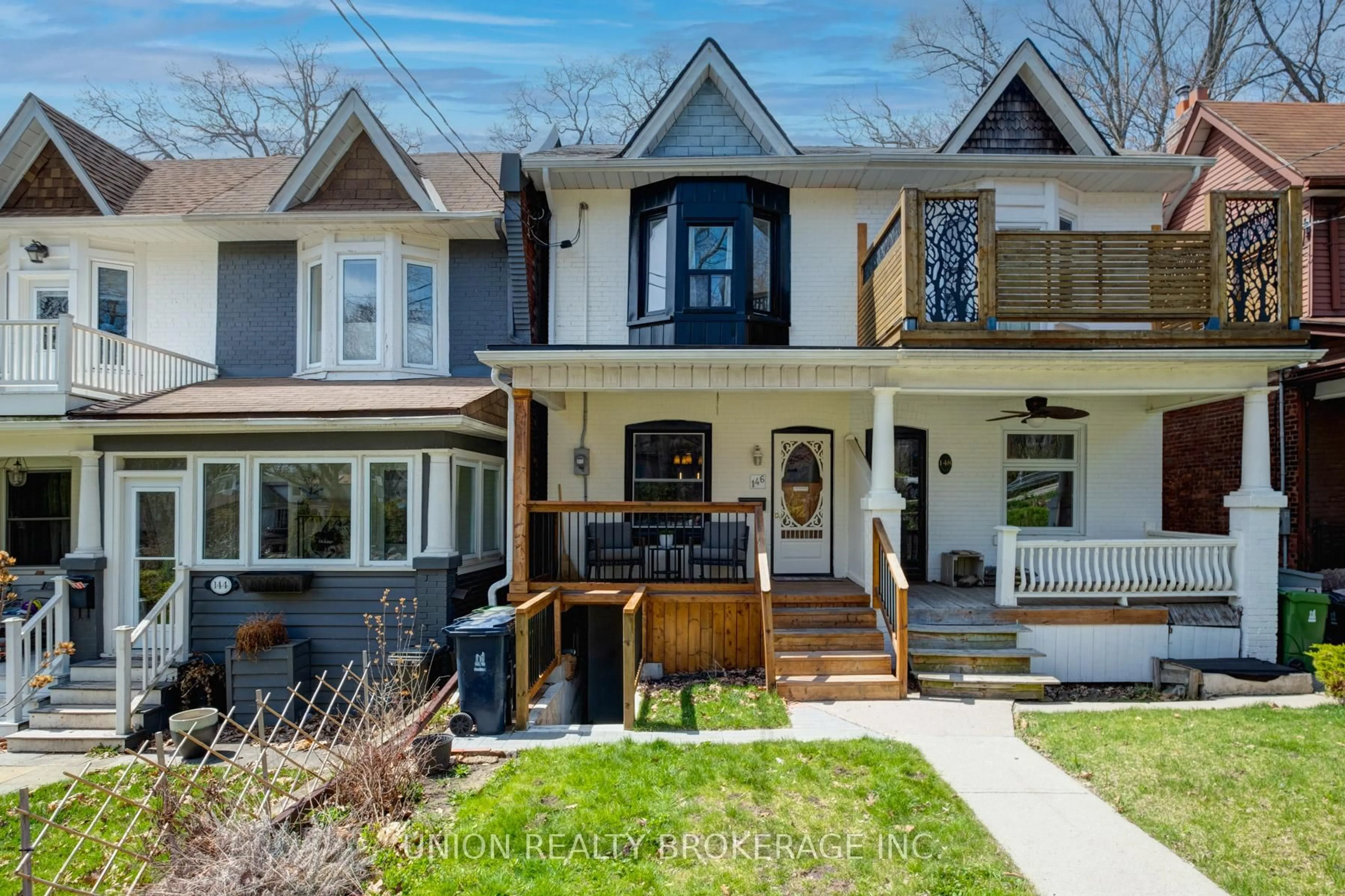 Home with brick exterior material, street for 146 Beech Ave, Toronto Ontario M4E 3H6