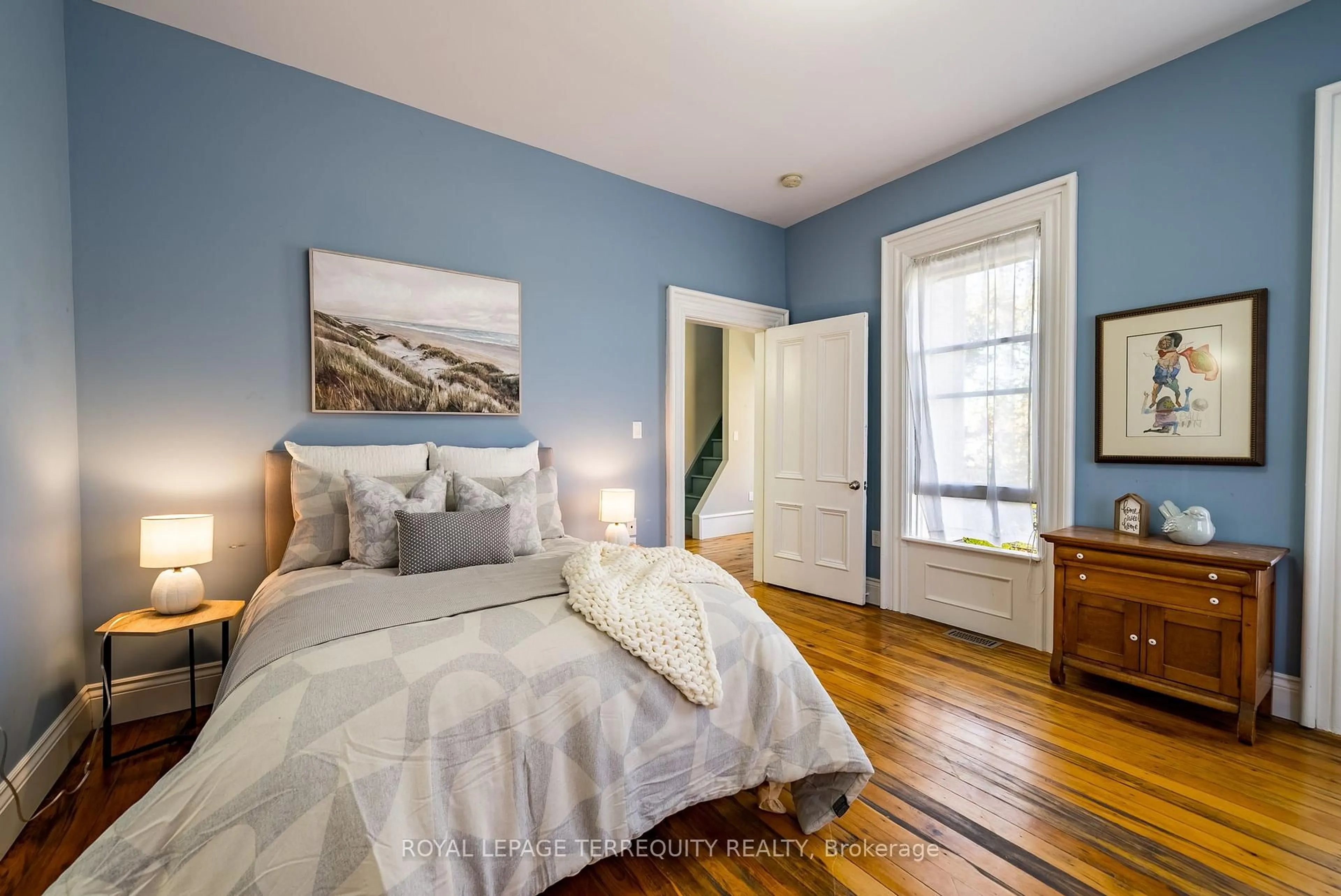 Bedroom with bed, wood/laminate floor for 14576 Old Simcoe Rd, Scugog Ontario L9L 1C1