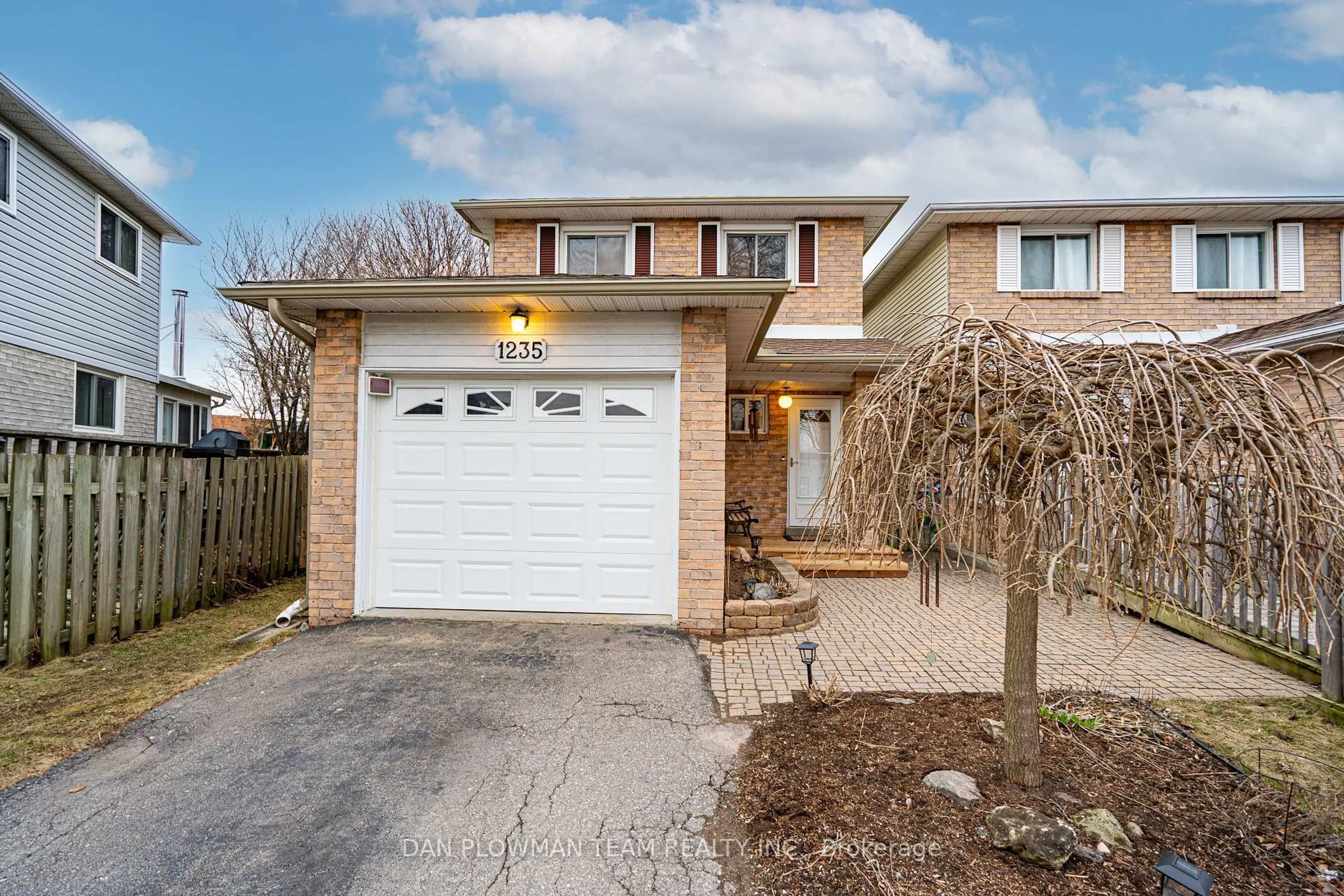 Home with brick exterior material, street for 1235 Delmark Crt, Oshawa Ontario L1H 8K6