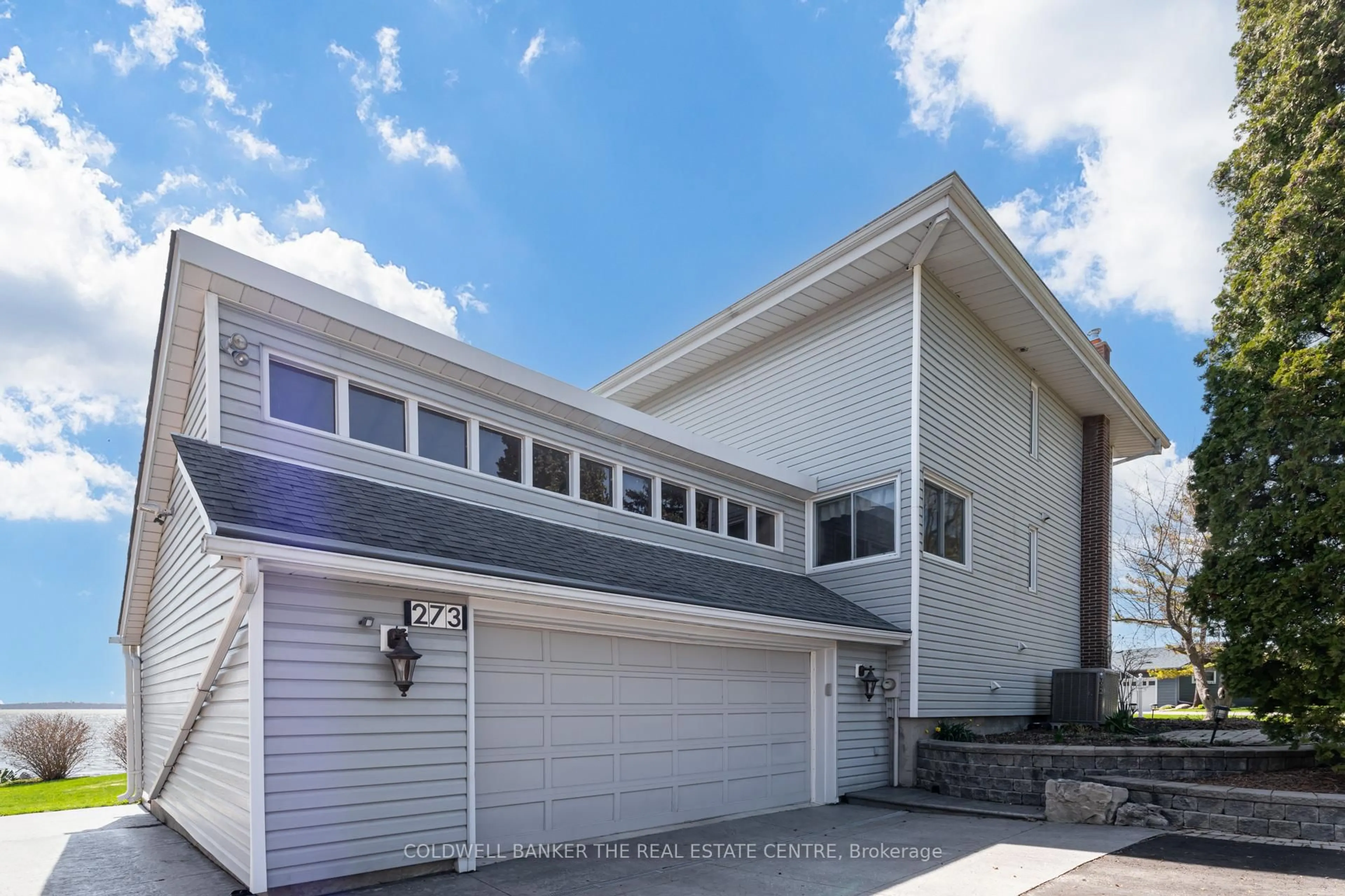 Home with vinyl exterior material, street for 273 Stephenson Point Rd, Scugog Ontario L9L 1B4