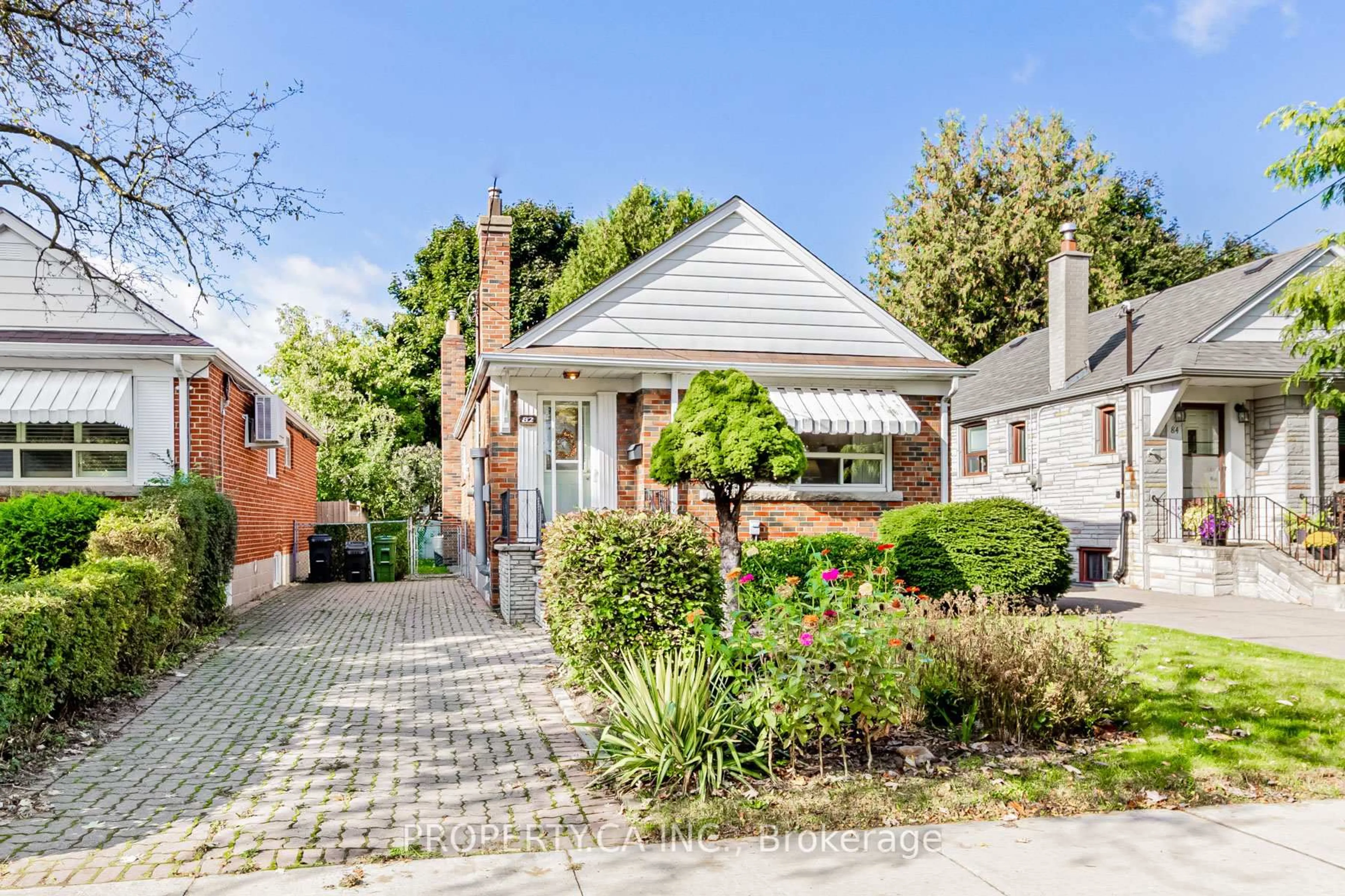 Home with brick exterior material, street for 82 Cedarcrest Blvd, Toronto Ontario M4B 2P3