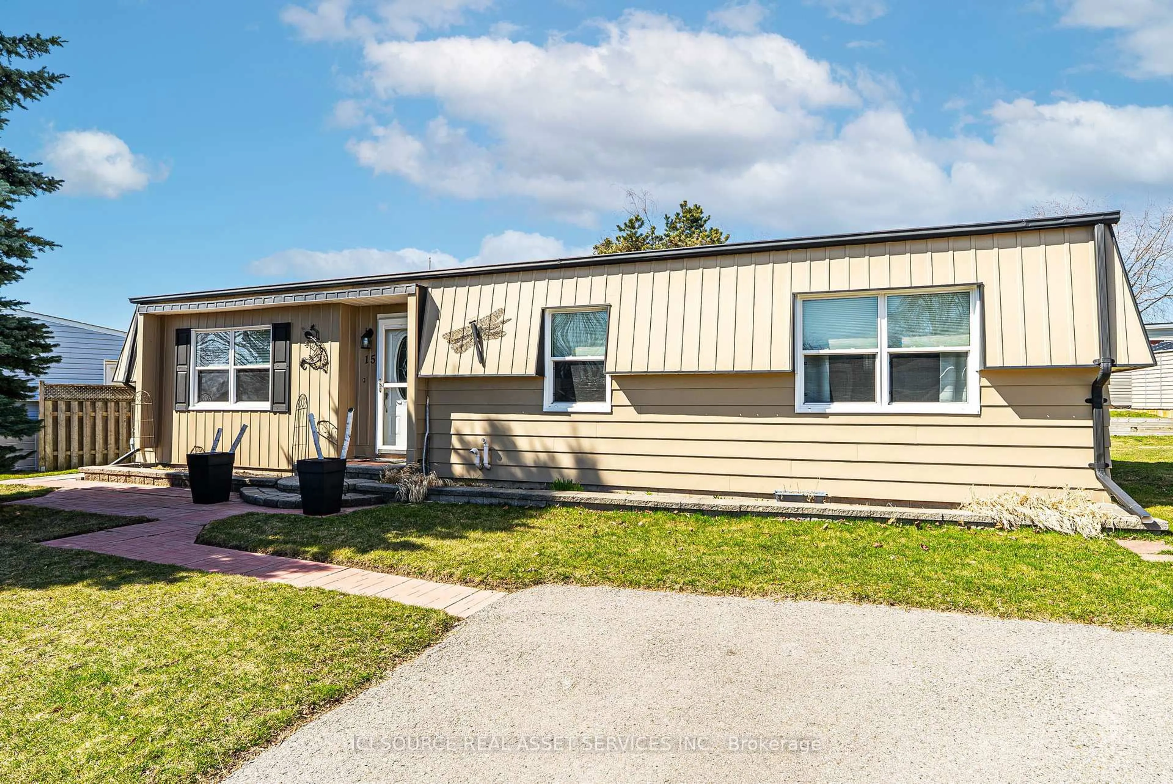 Home with vinyl exterior material, street for 15 Driftwood Lane, Clarington Ontario L1B 1A7