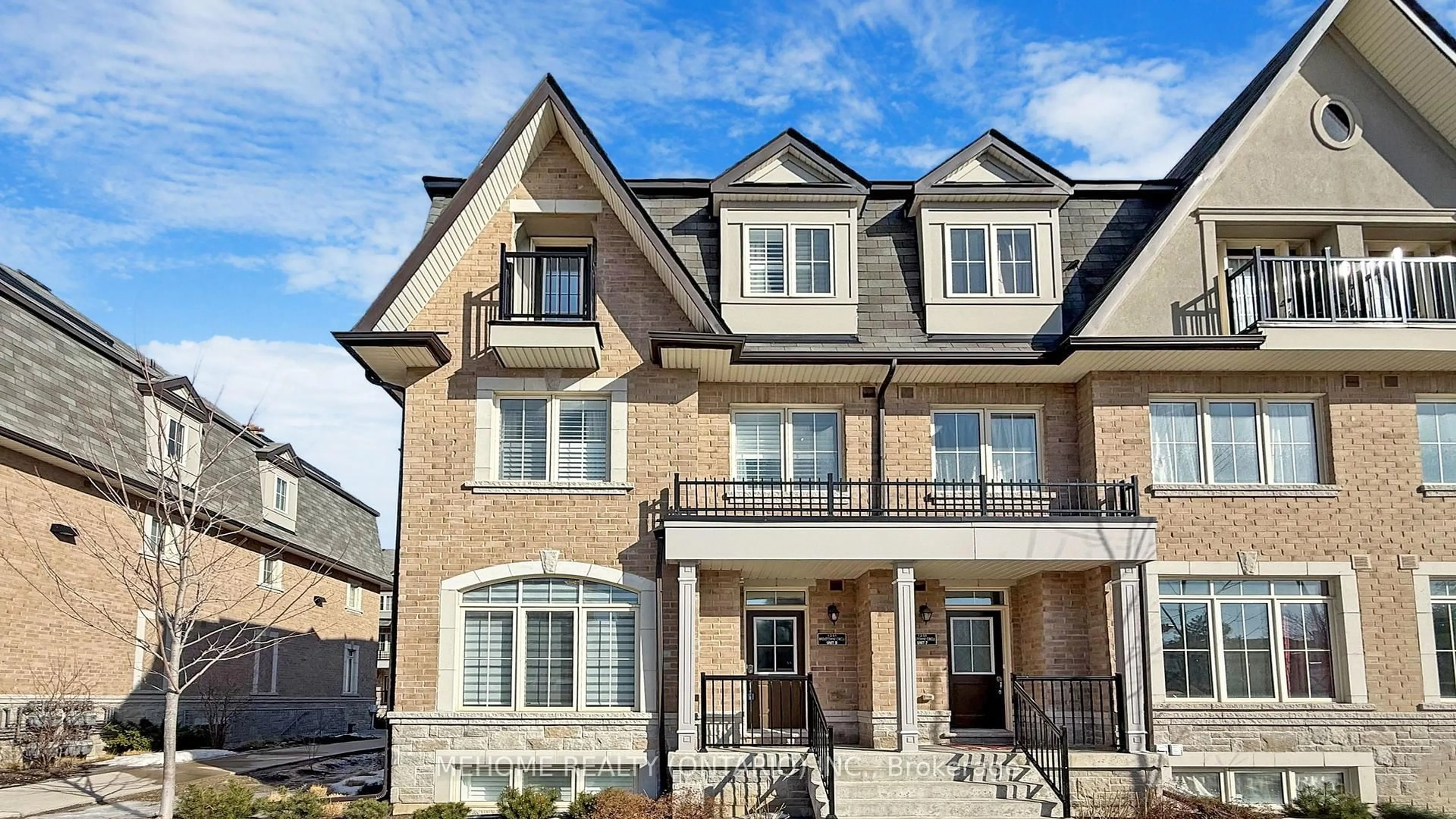 Home with brick exterior material, street for 1251 Bridletowne Circ #6, Toronto Ontario M1W 1S7