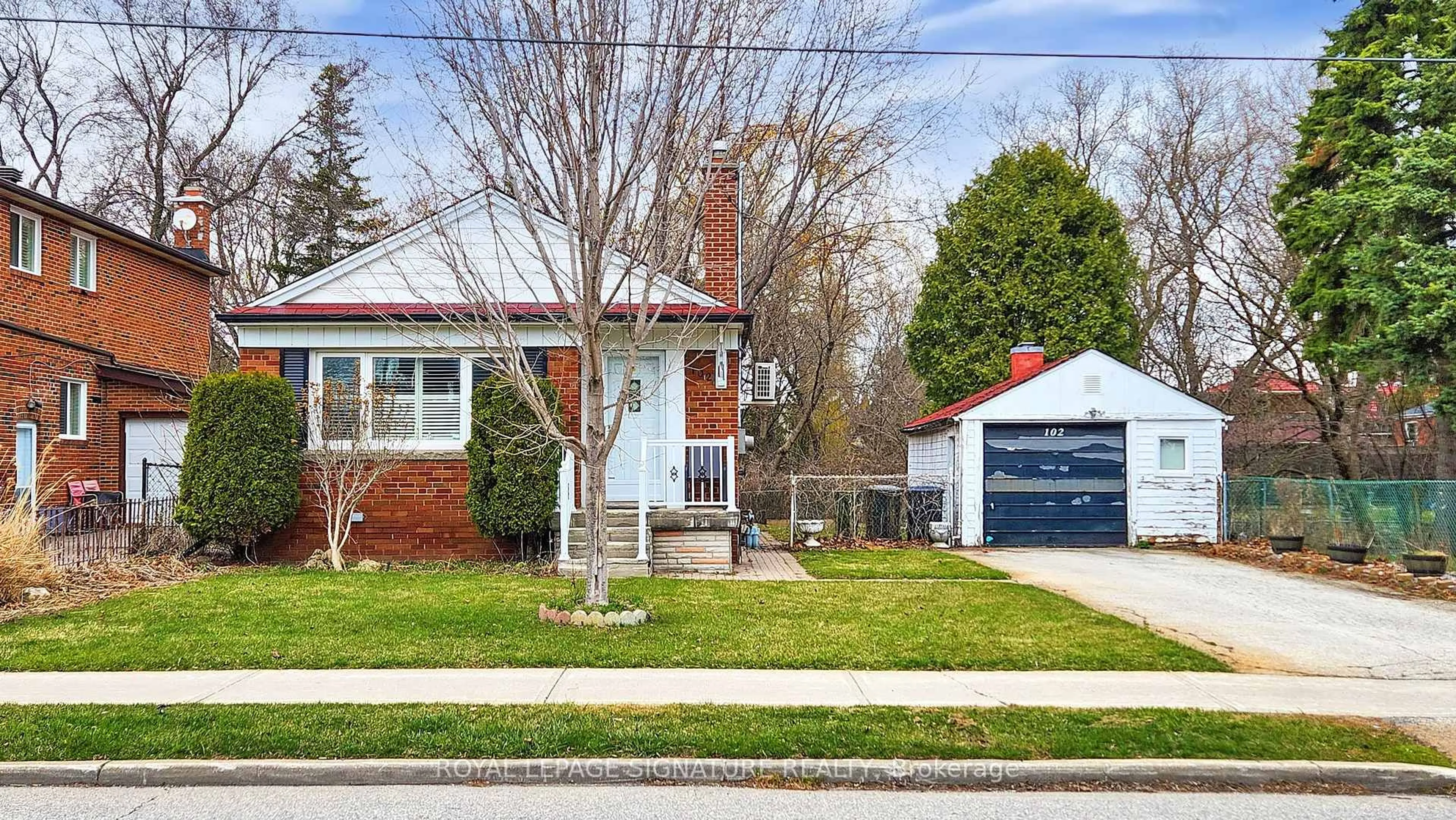Home with brick exterior material, street for 102 Murray Glen Dr, Toronto Ontario M1R 3K2