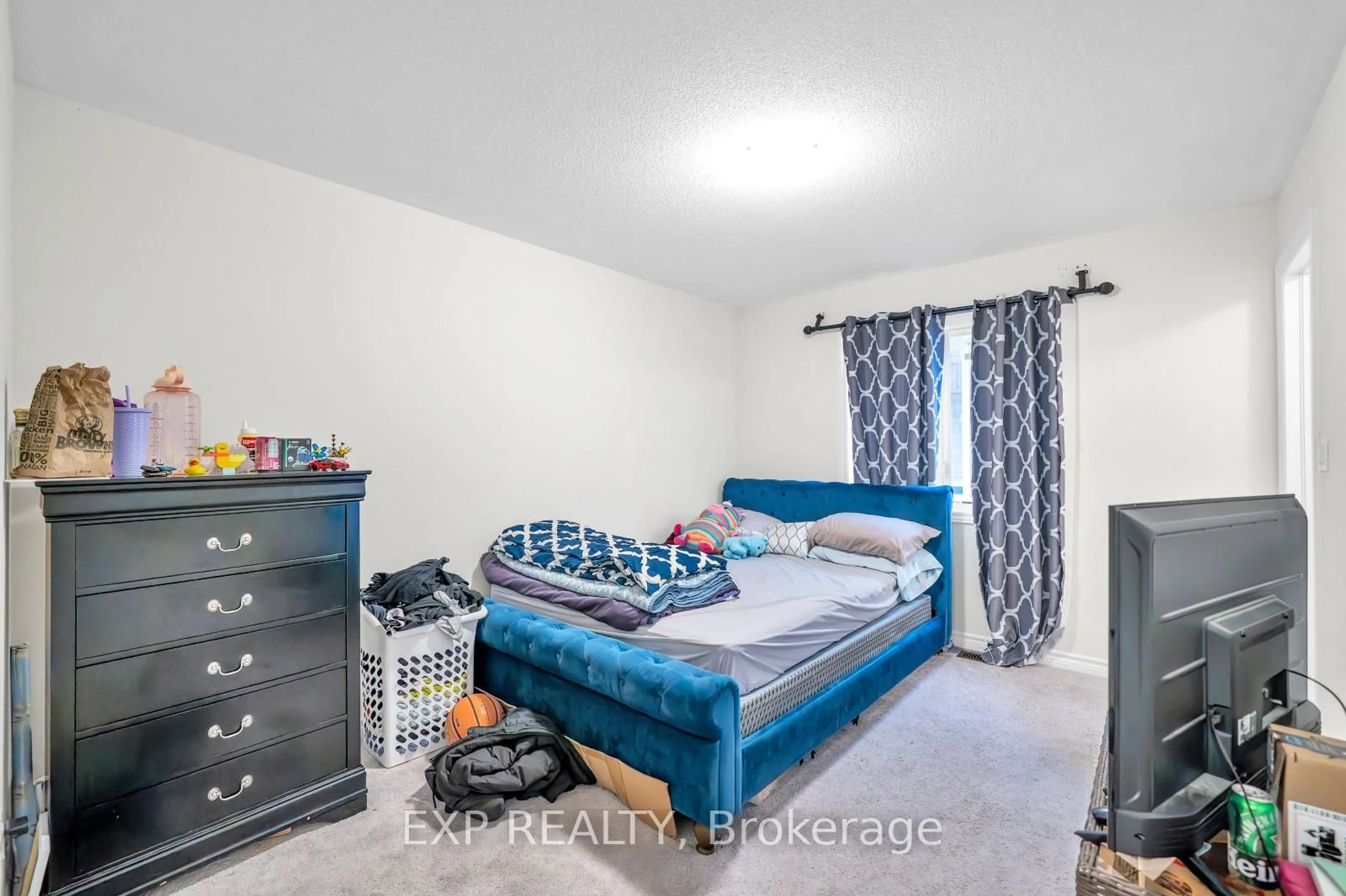 Bedroom with bed, carpet floor for 217 Doug Finney St, Oshawa Ontario L1K 3G3