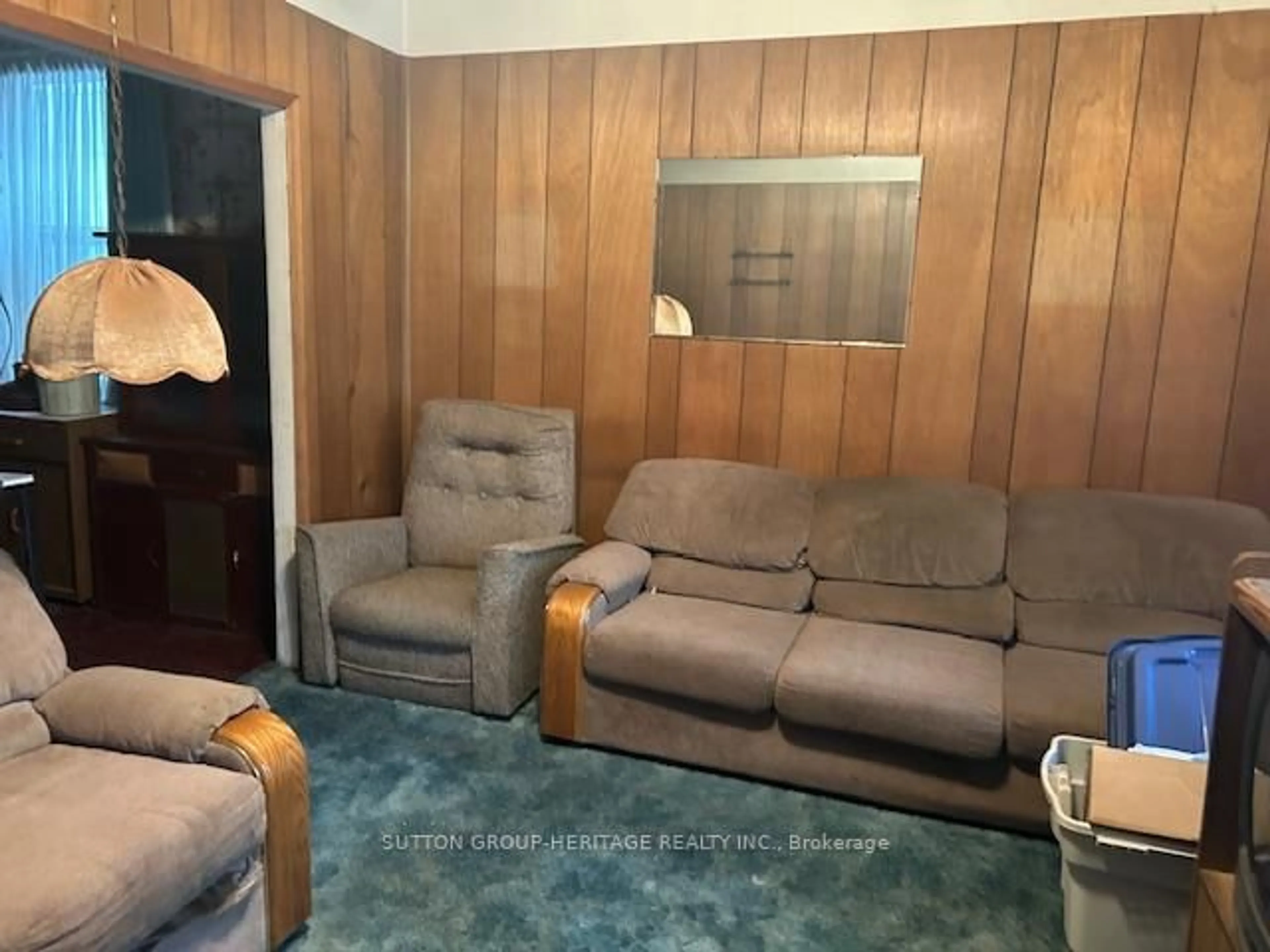 Living room with furniture, unknown for 1547 Dundas St, Toronto Ontario M4L 1K6