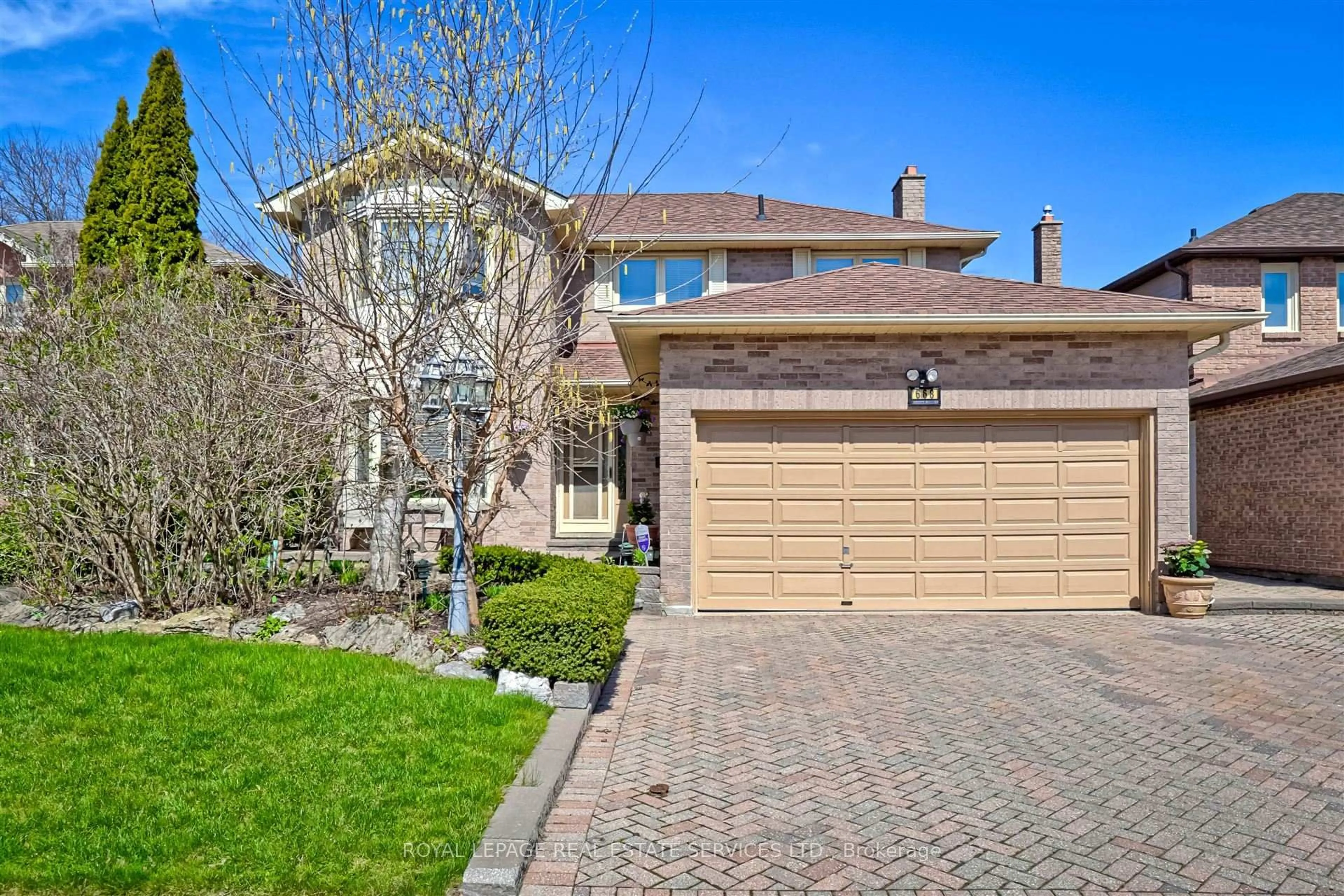 Home with brick exterior material, street for 668 Amaretto Ave, Pickering Ontario L1X 1M5